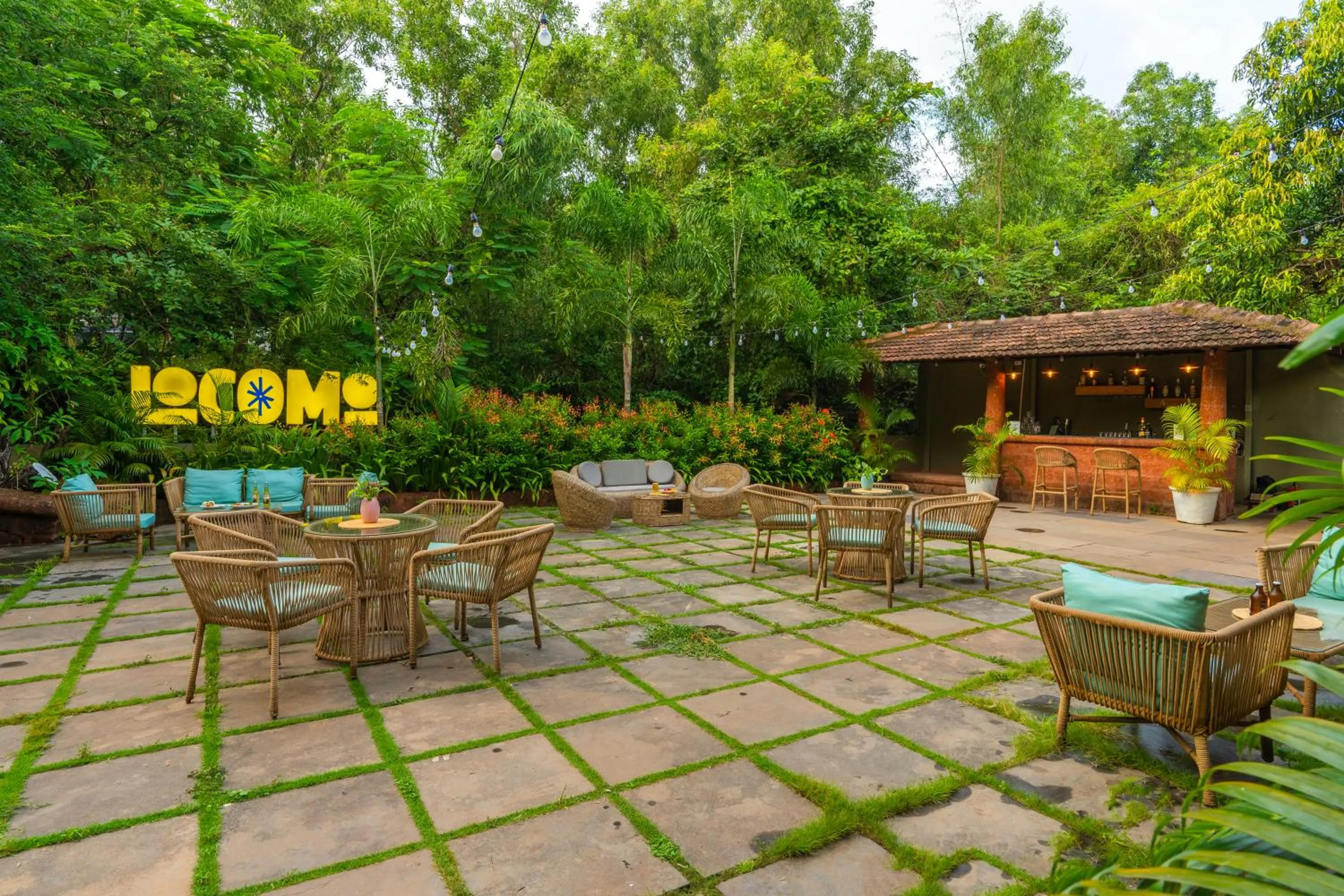 Garden view in Locomo Boutique, Morjim - Cozy tropical stay, near beach