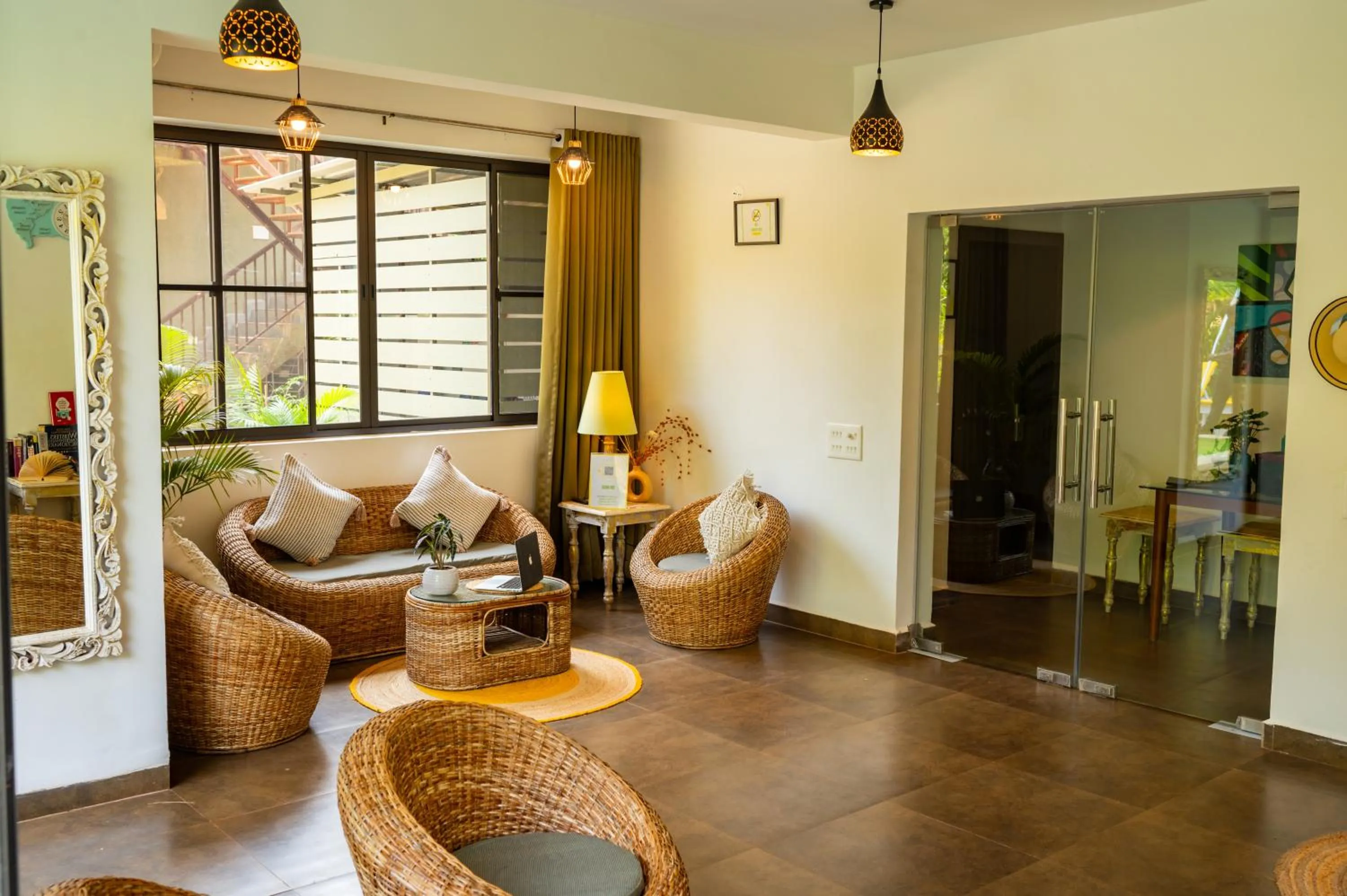 Living room in Locomo Boutique, Morjim - Cozy tropical stay, near beach
