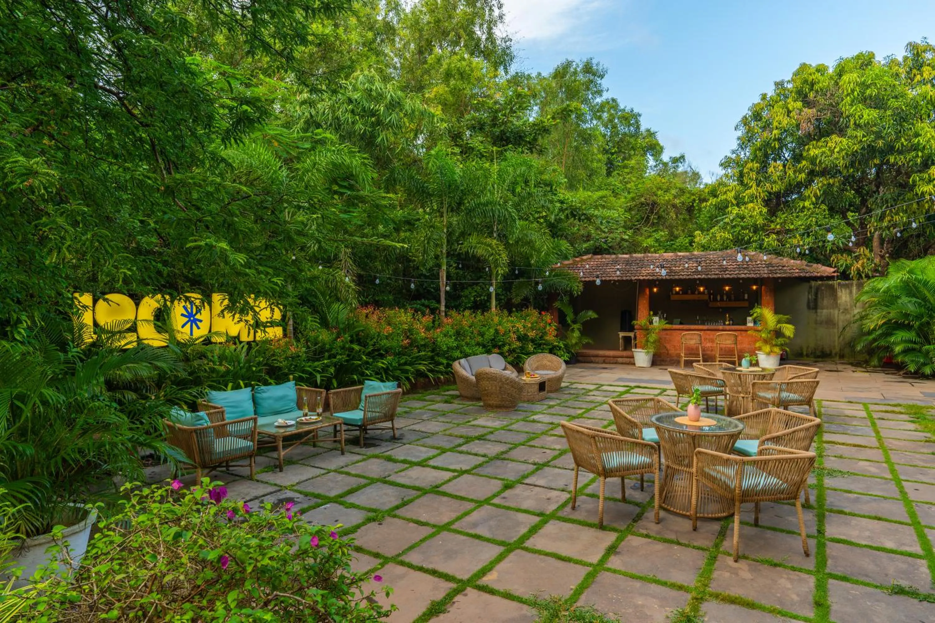 Garden view in Locomo Boutique, Morjim - Cozy tropical stay, near beach