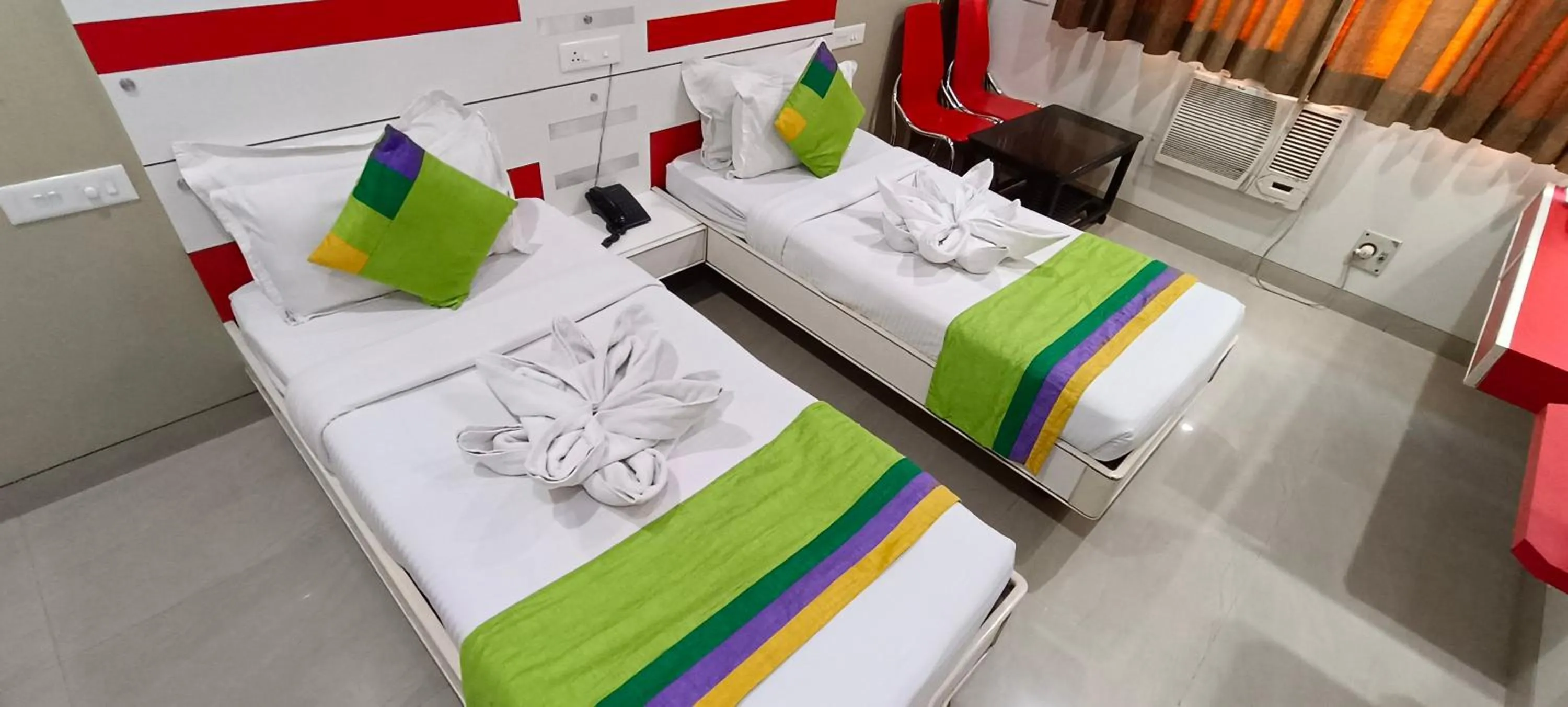 Bed in Hotel Bagga International