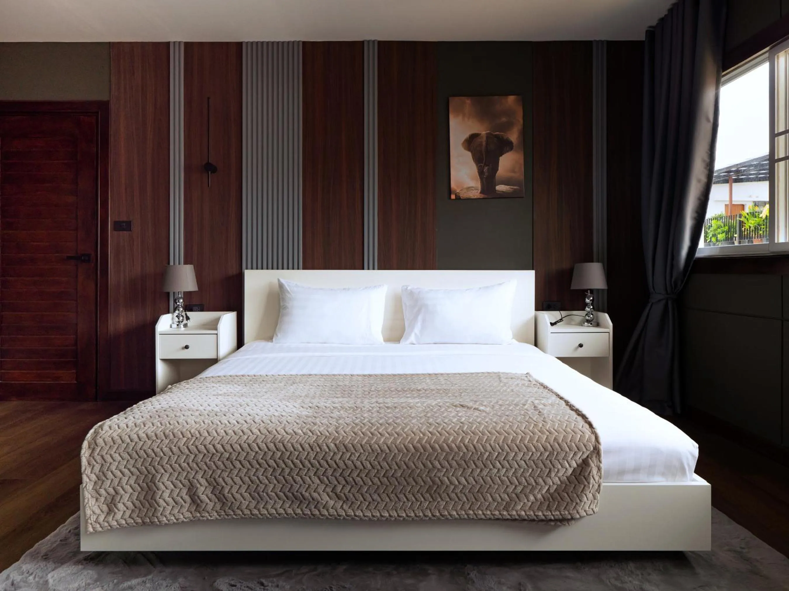 Bed in Grand Orlov Apart Hotel