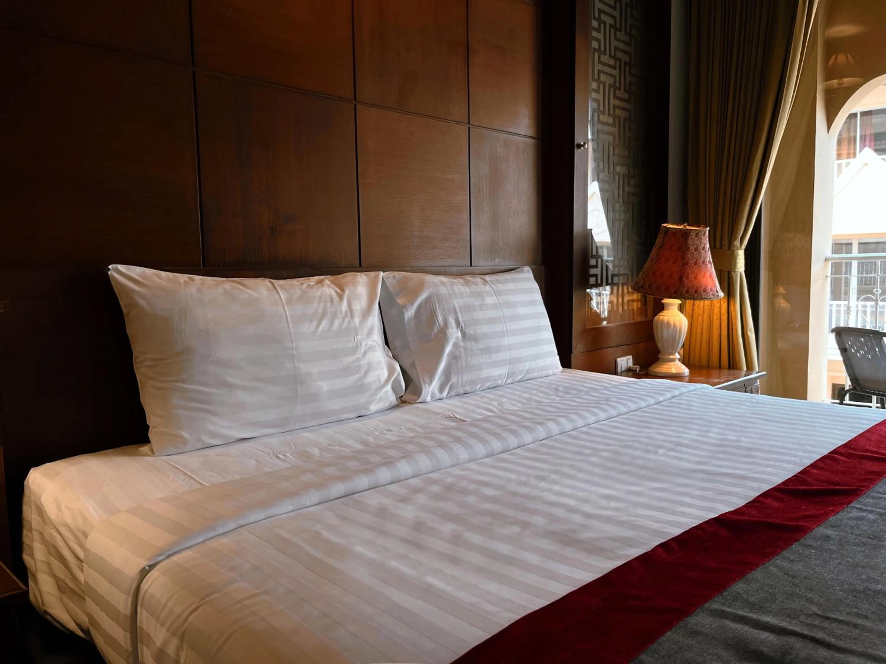 Bed in Grand Orlov Apart Hotel