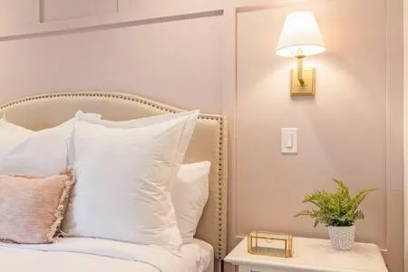 Bed in Downtown Luxury Farmhouse Apartment #1