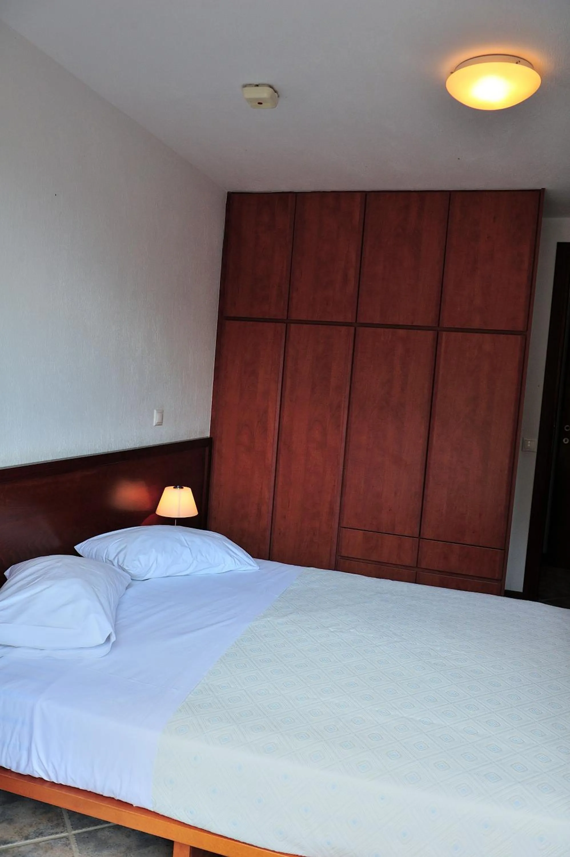 Bed in Eye Q Resort Seaview