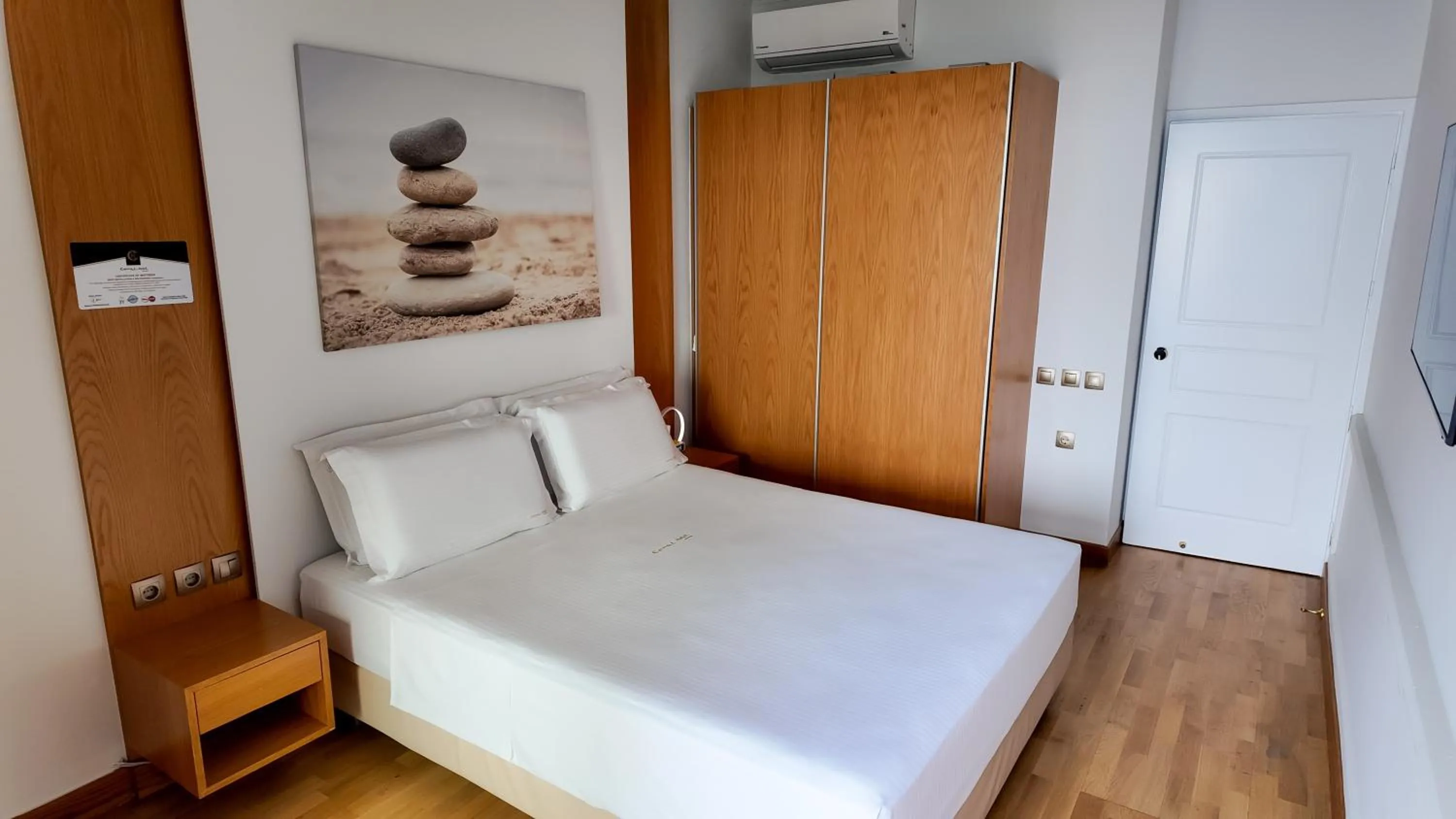 Bed in Coral Hotel Athens