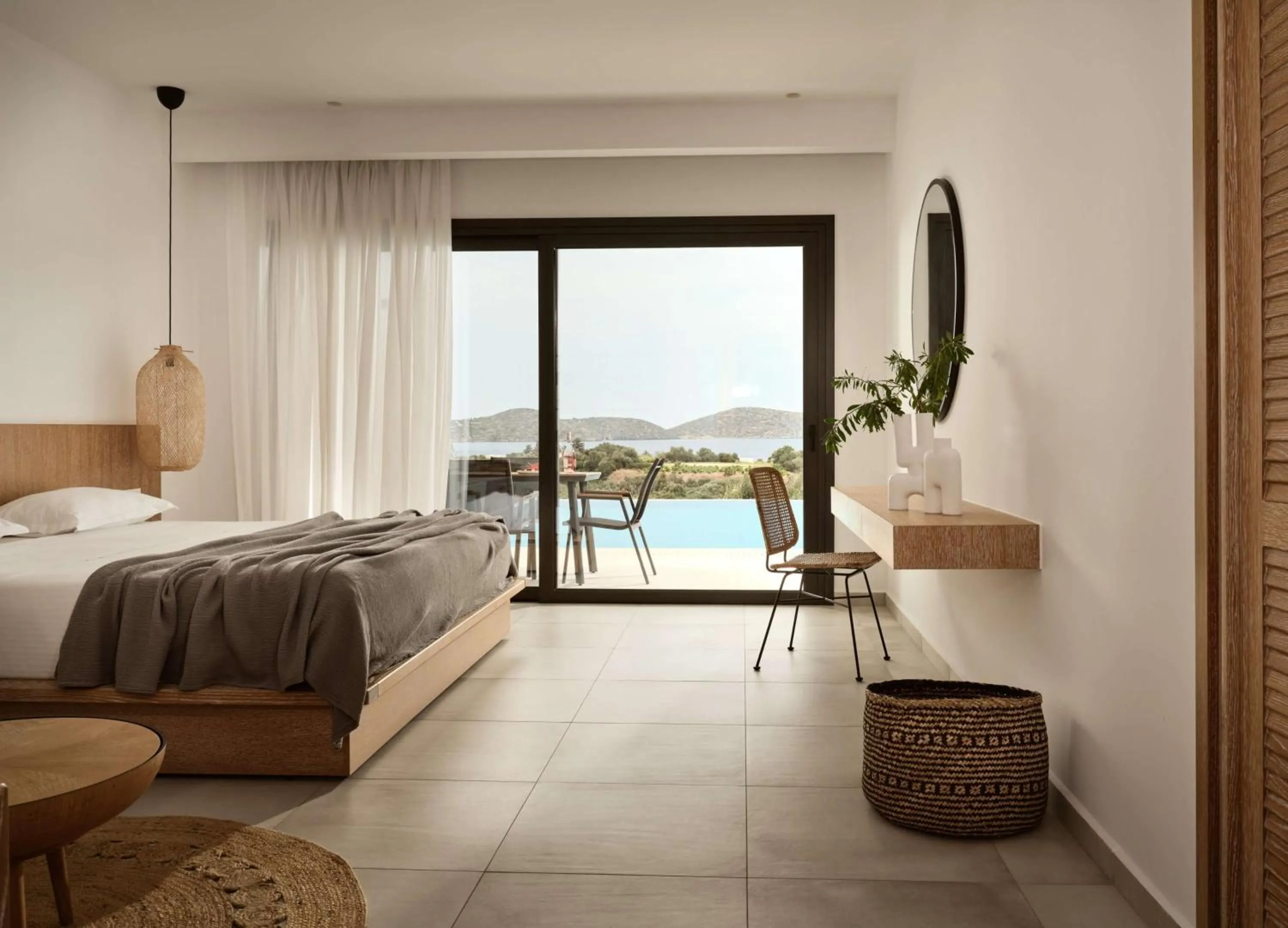 Bed in Elounda Palm Hotel & Suites