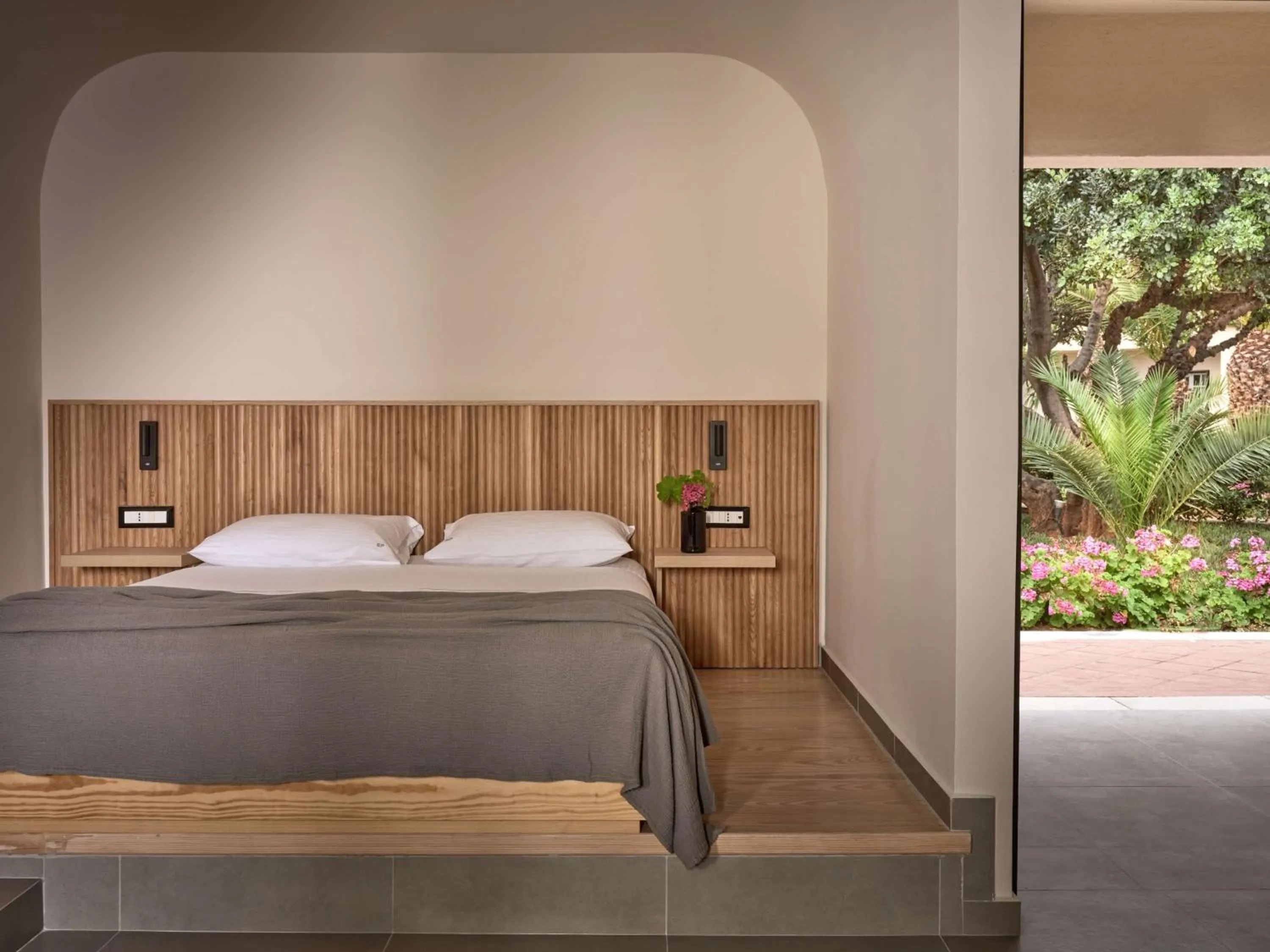 Bed in Elounda Palm Hotel & Suites