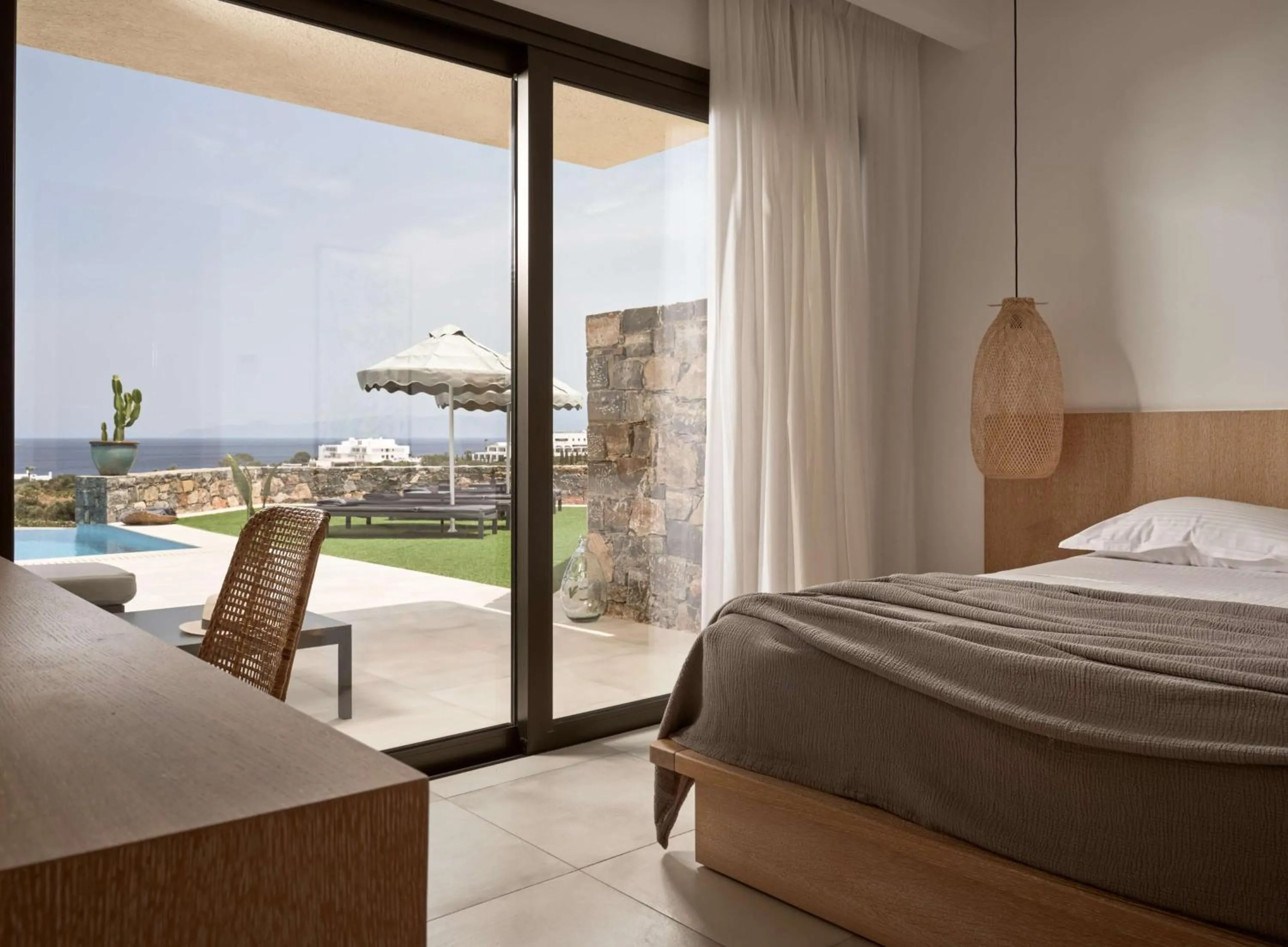 Bed in Elounda Palm Hotel & Suites