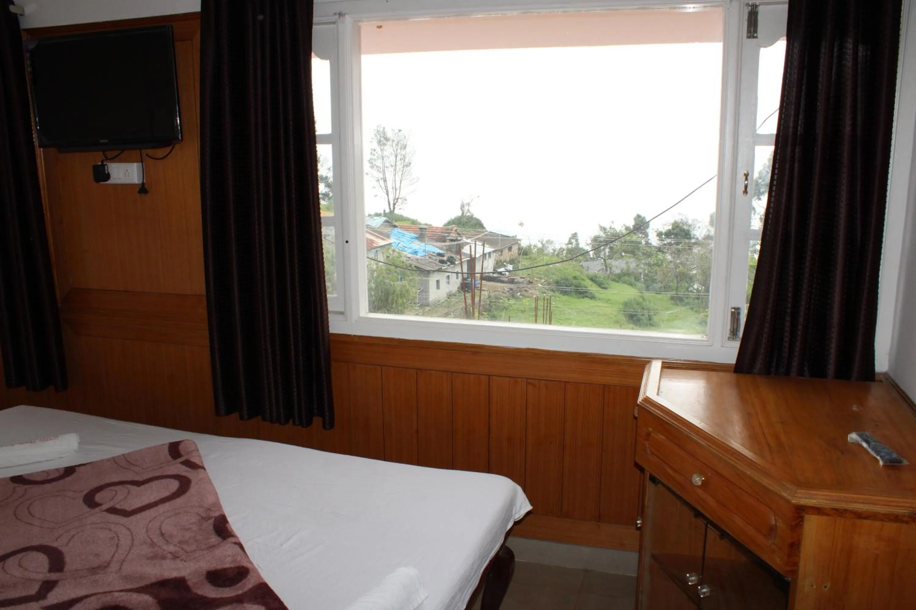 Bed in Hotel Temple Towers