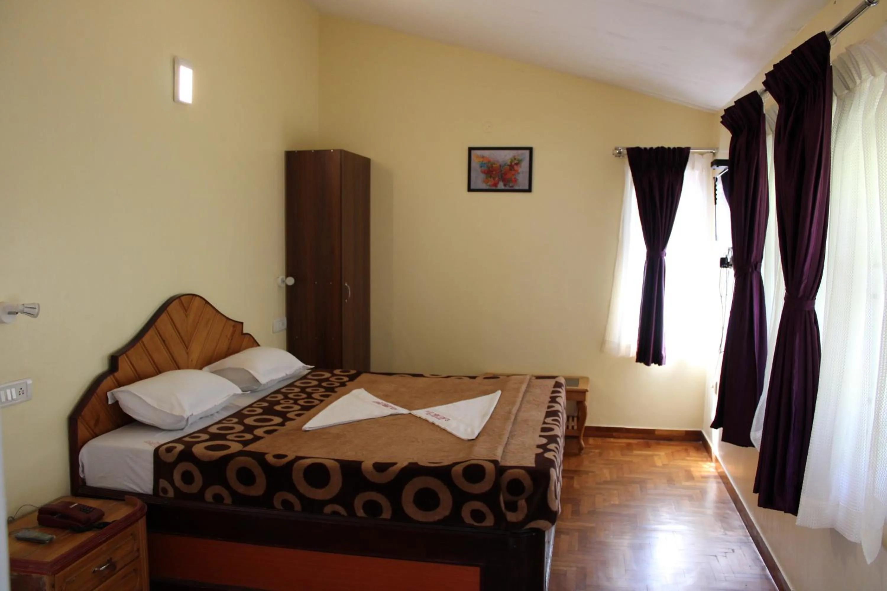 Bed in Hotel Temple Towers