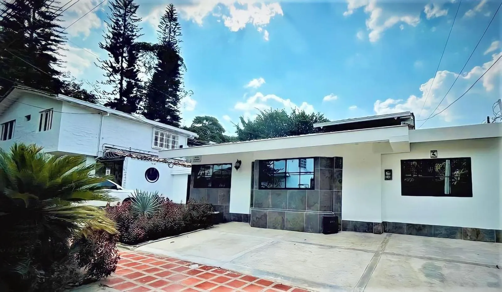 Property building in Hotel 12 Nights