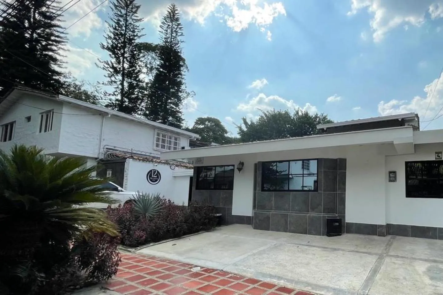 Property building in Hotel 12 Nights