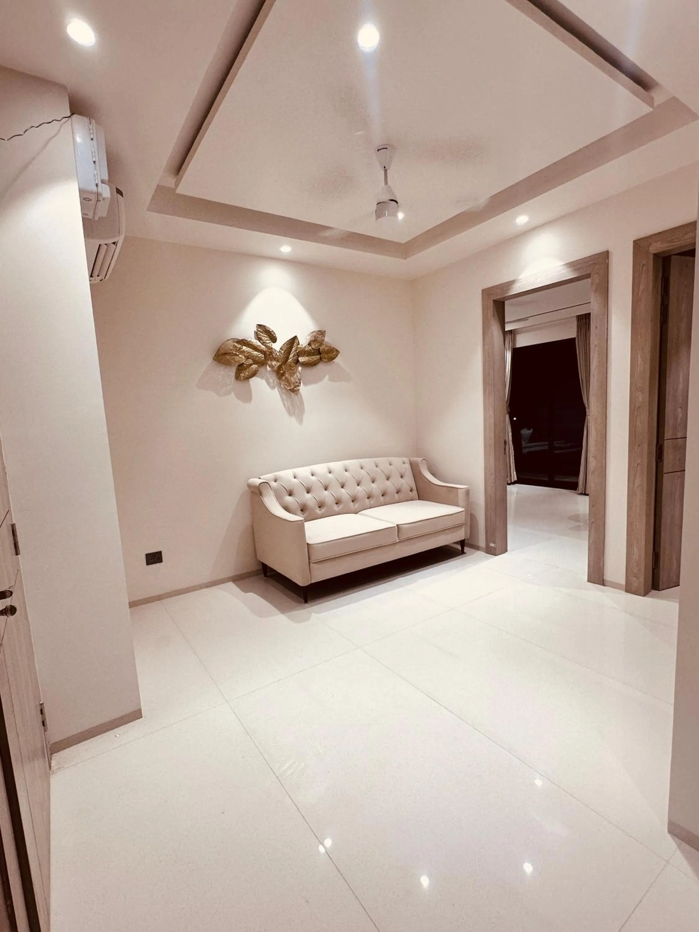 Living room, Bed in The Lodgers 2 BHK Serviced Apartment Near Artemis Hospital Sector 57 Gurgaon - Nearest Metro Station Sector 54 Chowk