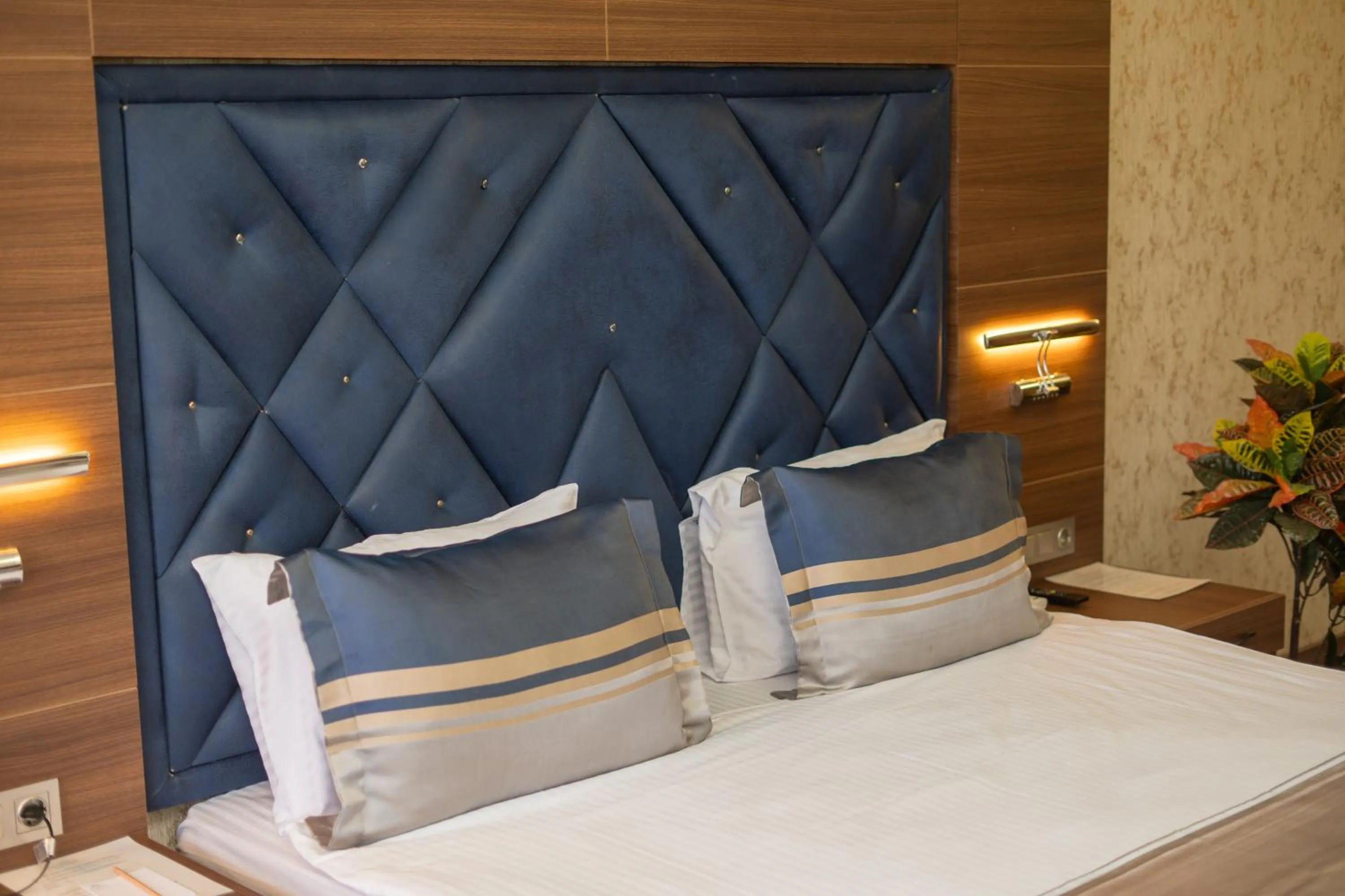 Bed in Velmore Hotel & Spa