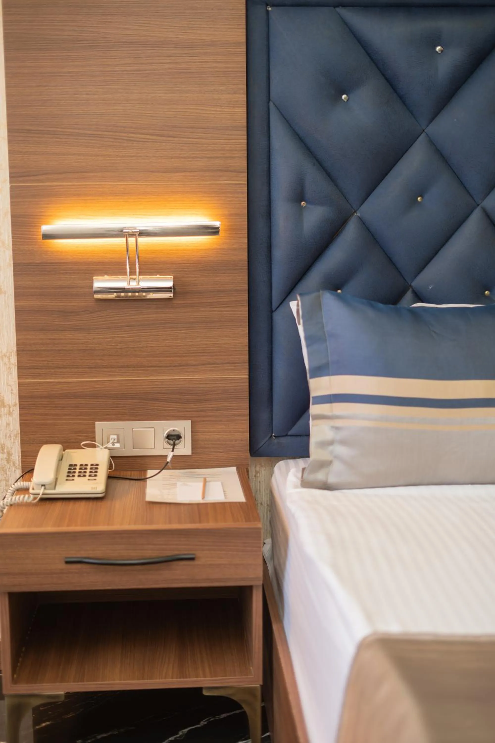 Bed in Velmore Hotel & Spa