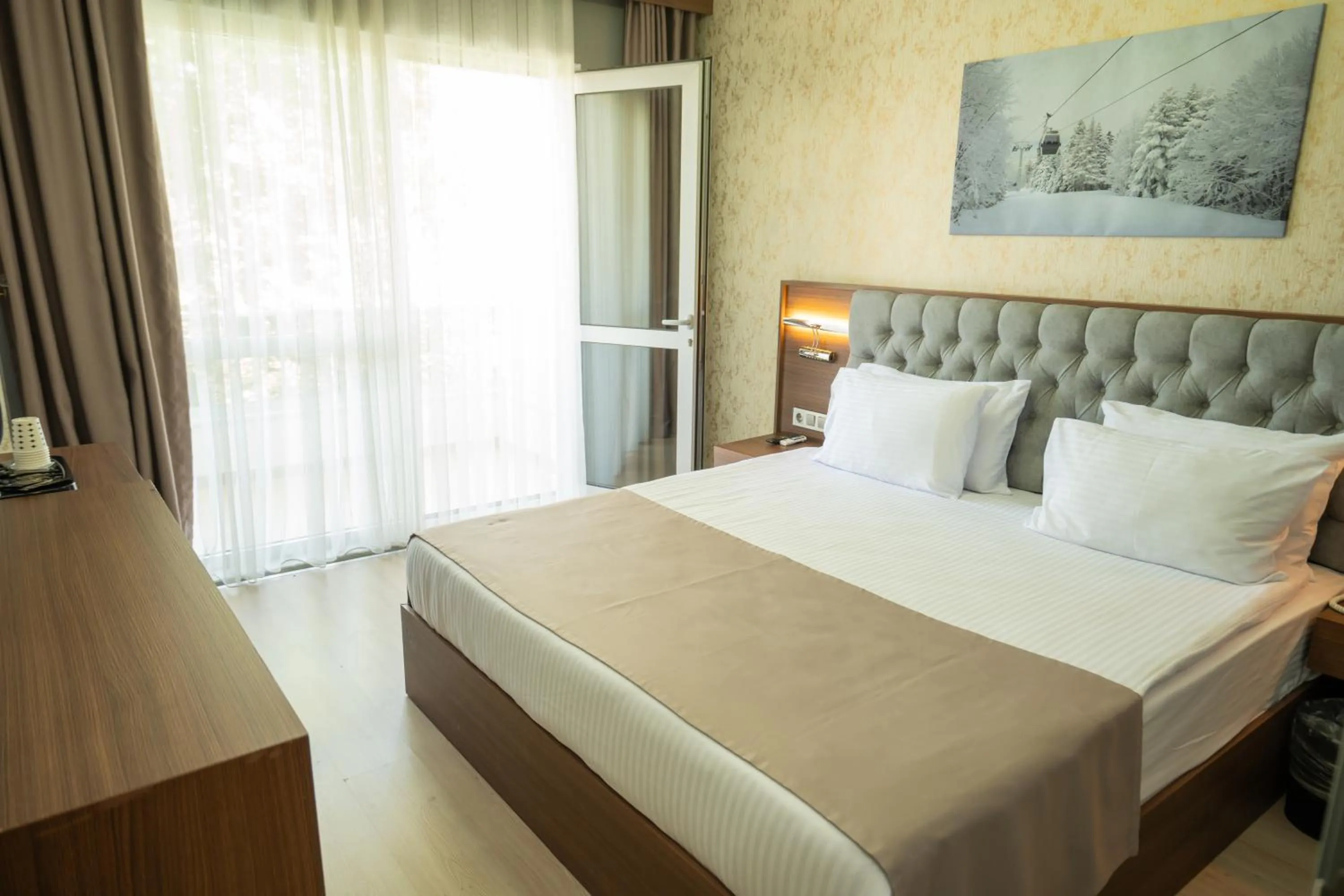 Bed in Velmore Hotel & Spa