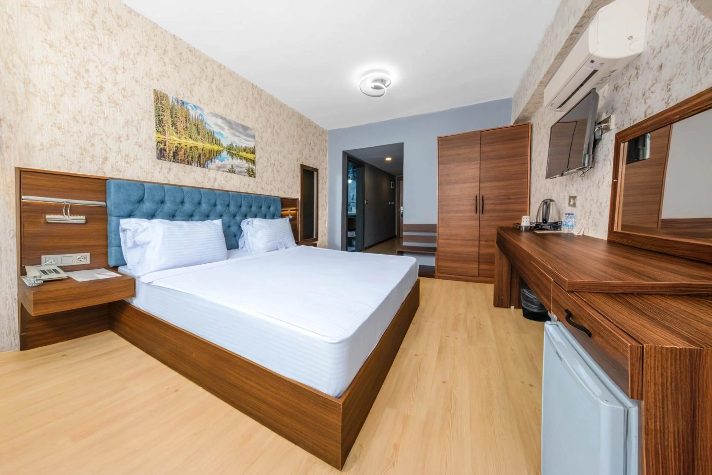 Bed in Velmore Hotel & Spa