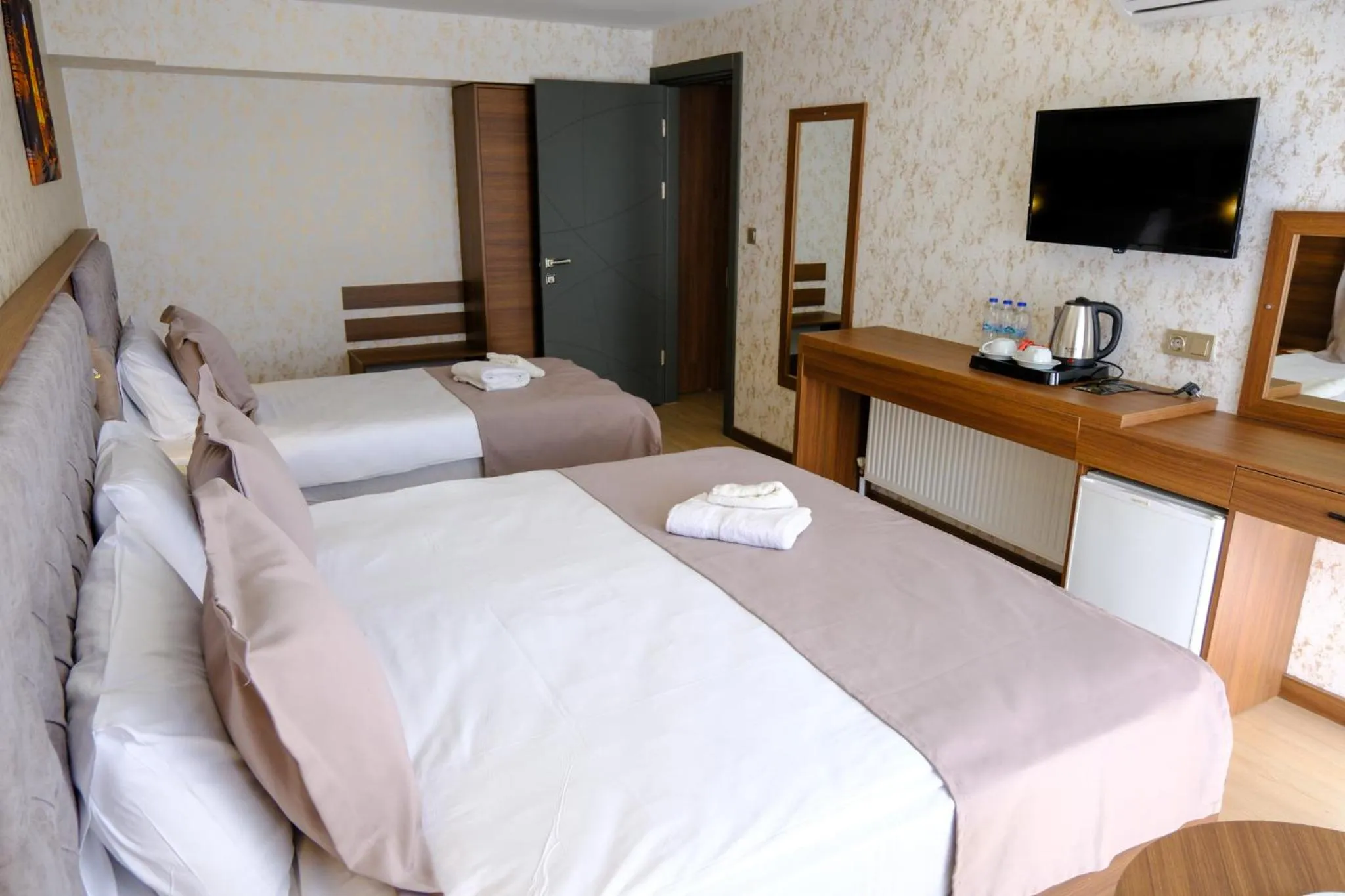 Bed in Velmore Hotel & Spa