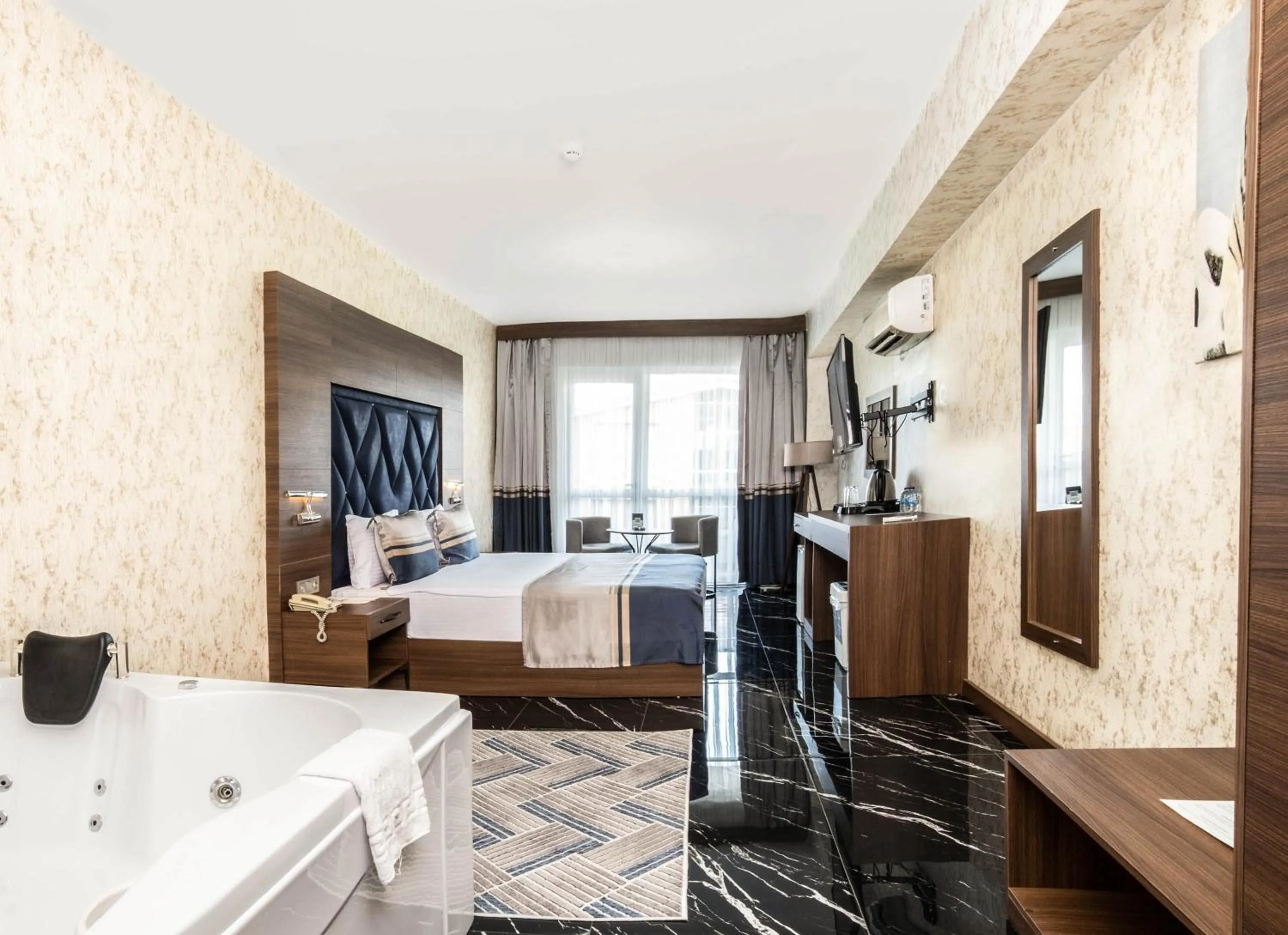 Bed in Velmore Hotel & Spa