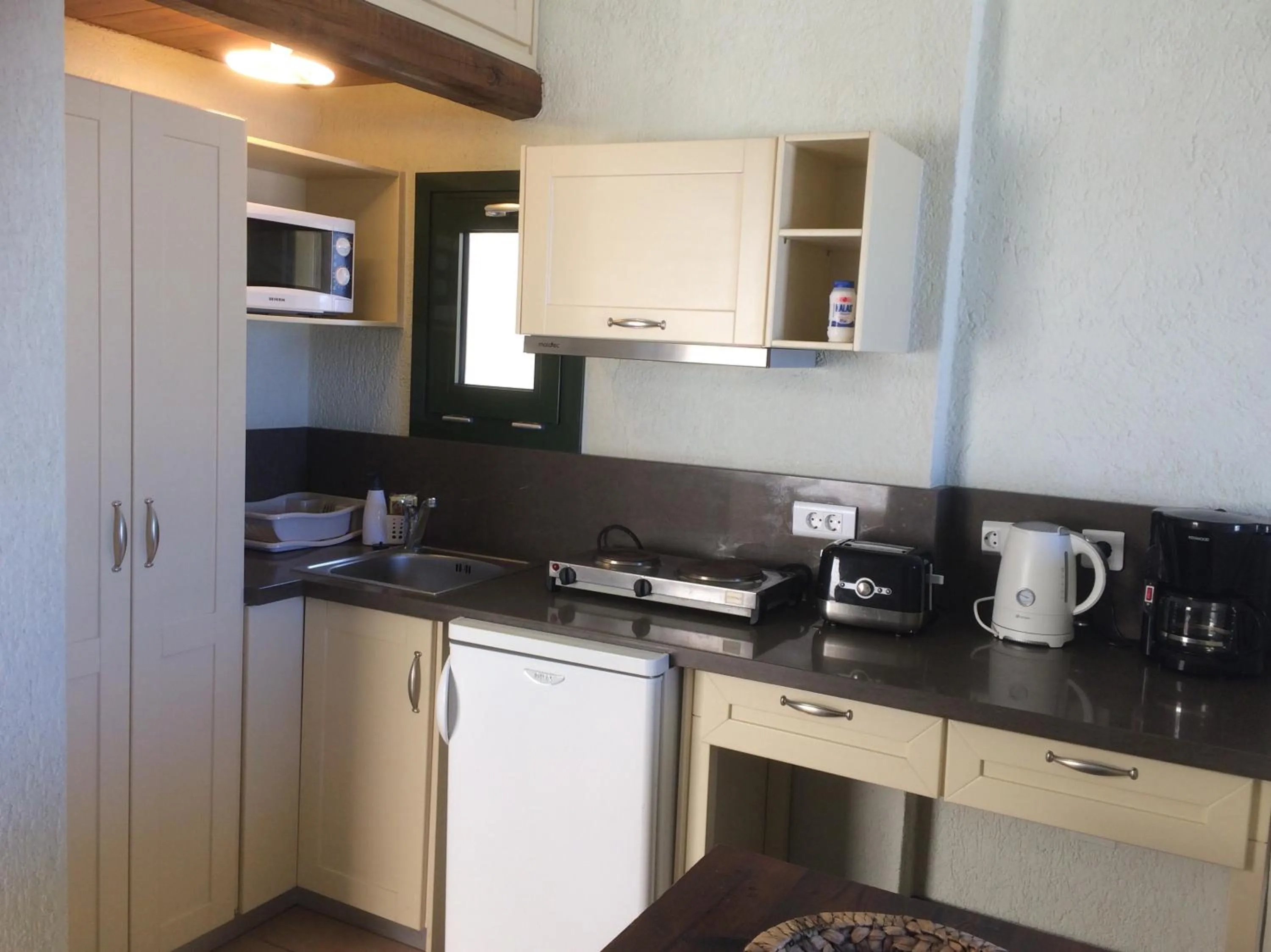 Kitchen or kitchenette in Porto Sisi Hotel Apartments