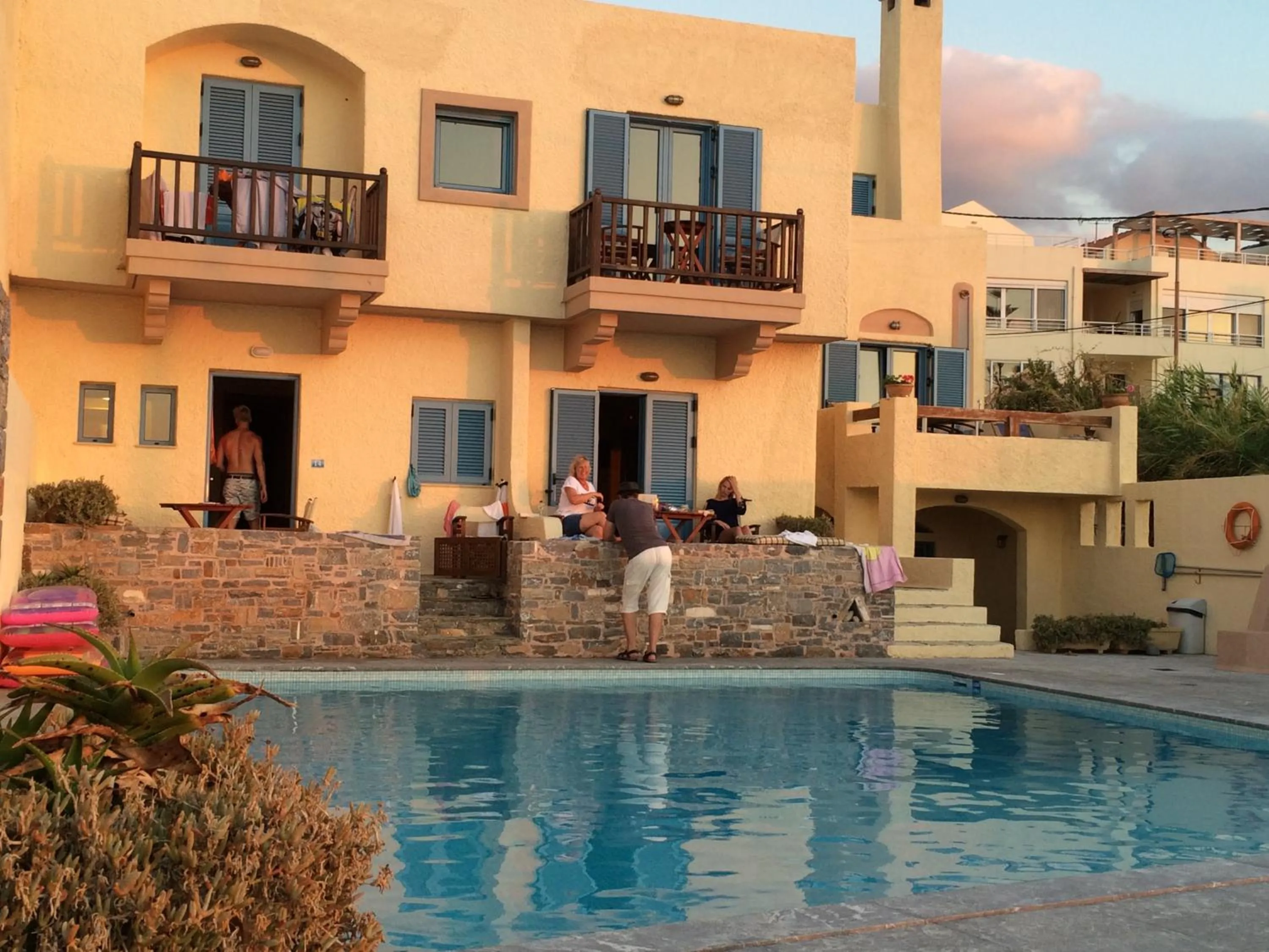 People in Porto Sisi Hotel Apartments