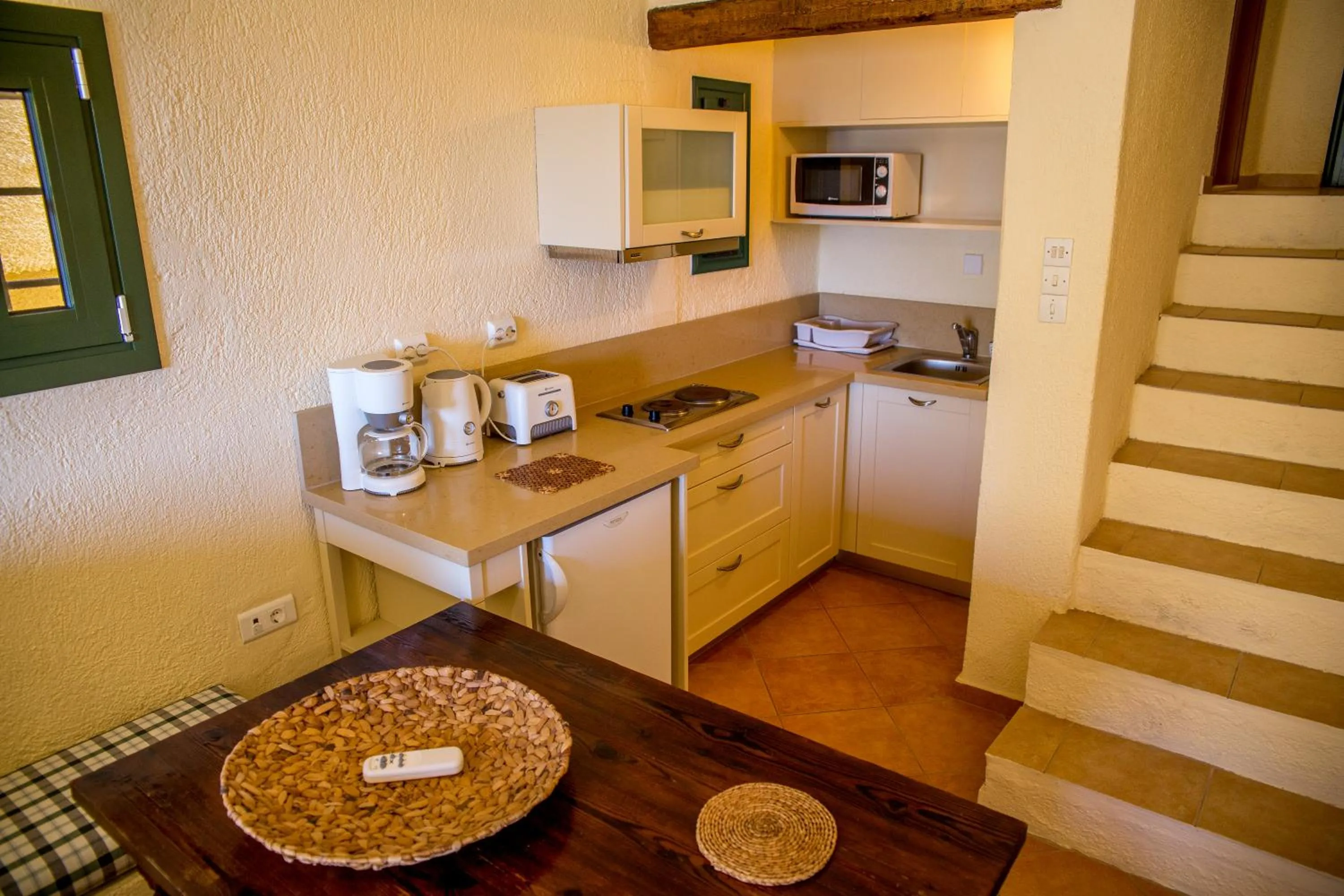 Kitchen or kitchenette in Porto Sisi Hotel Apartments