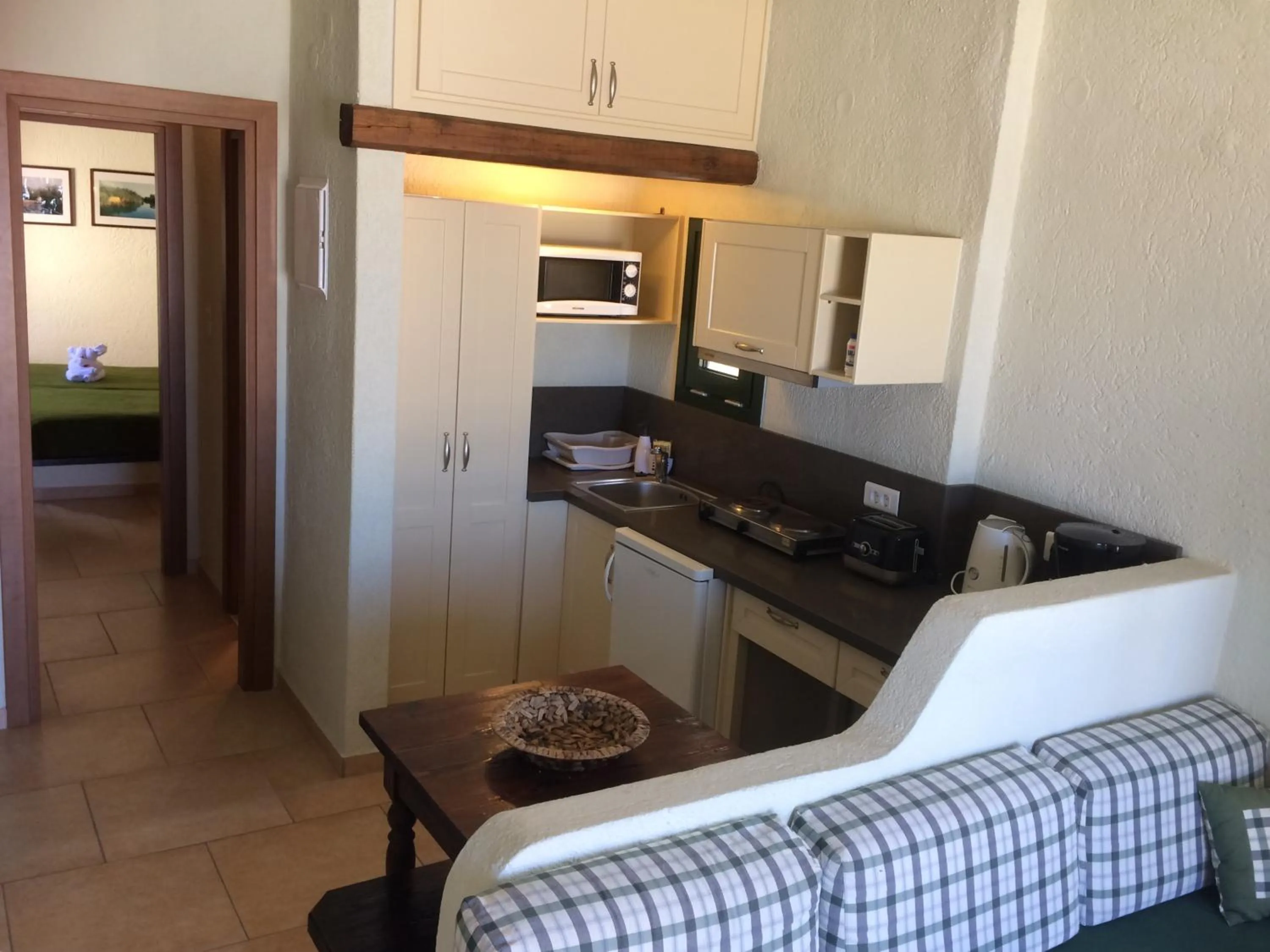 Kitchen or kitchenette in Porto Sisi Hotel Apartments