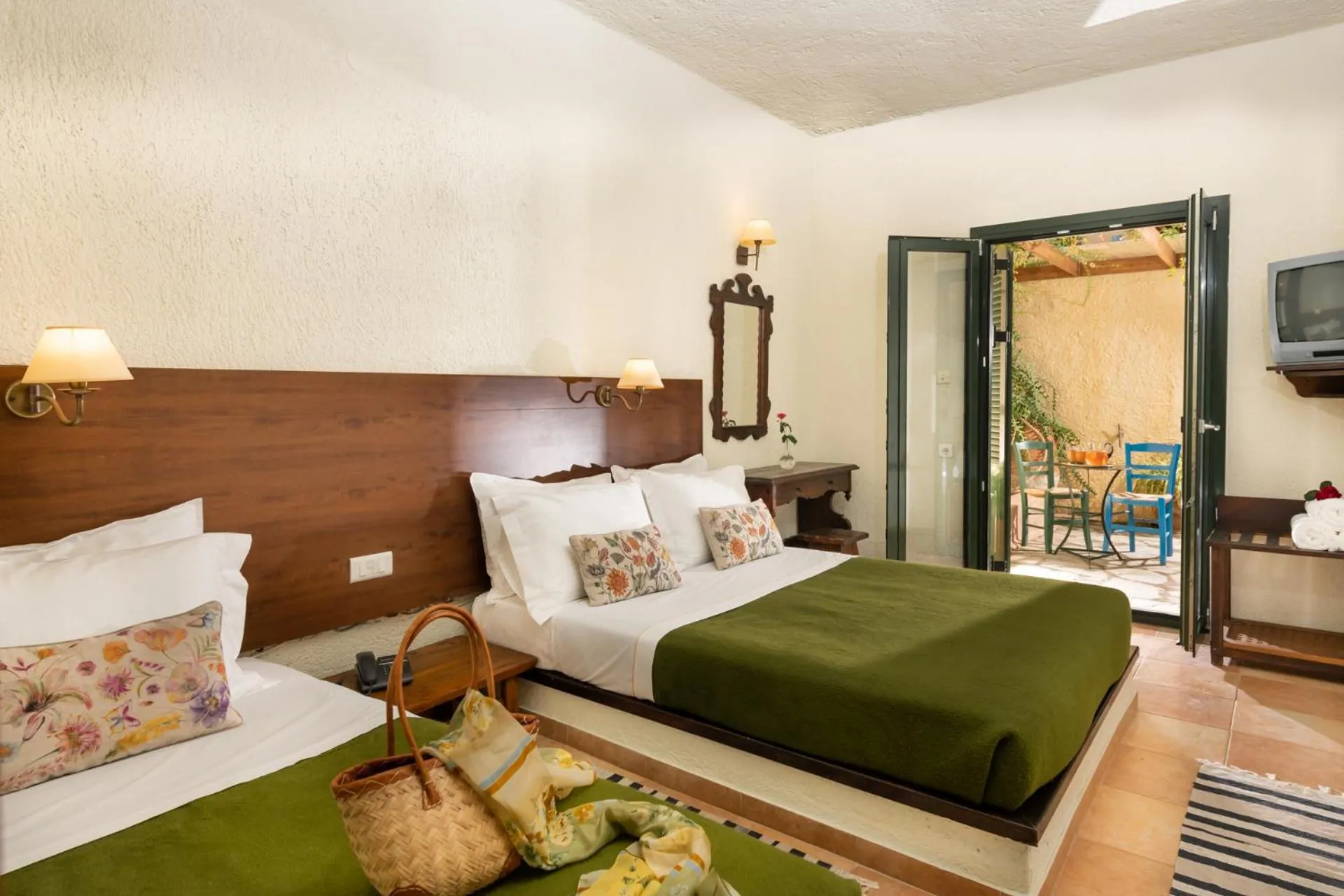 Patio, Bed in Porto Sisi Hotel Apartments