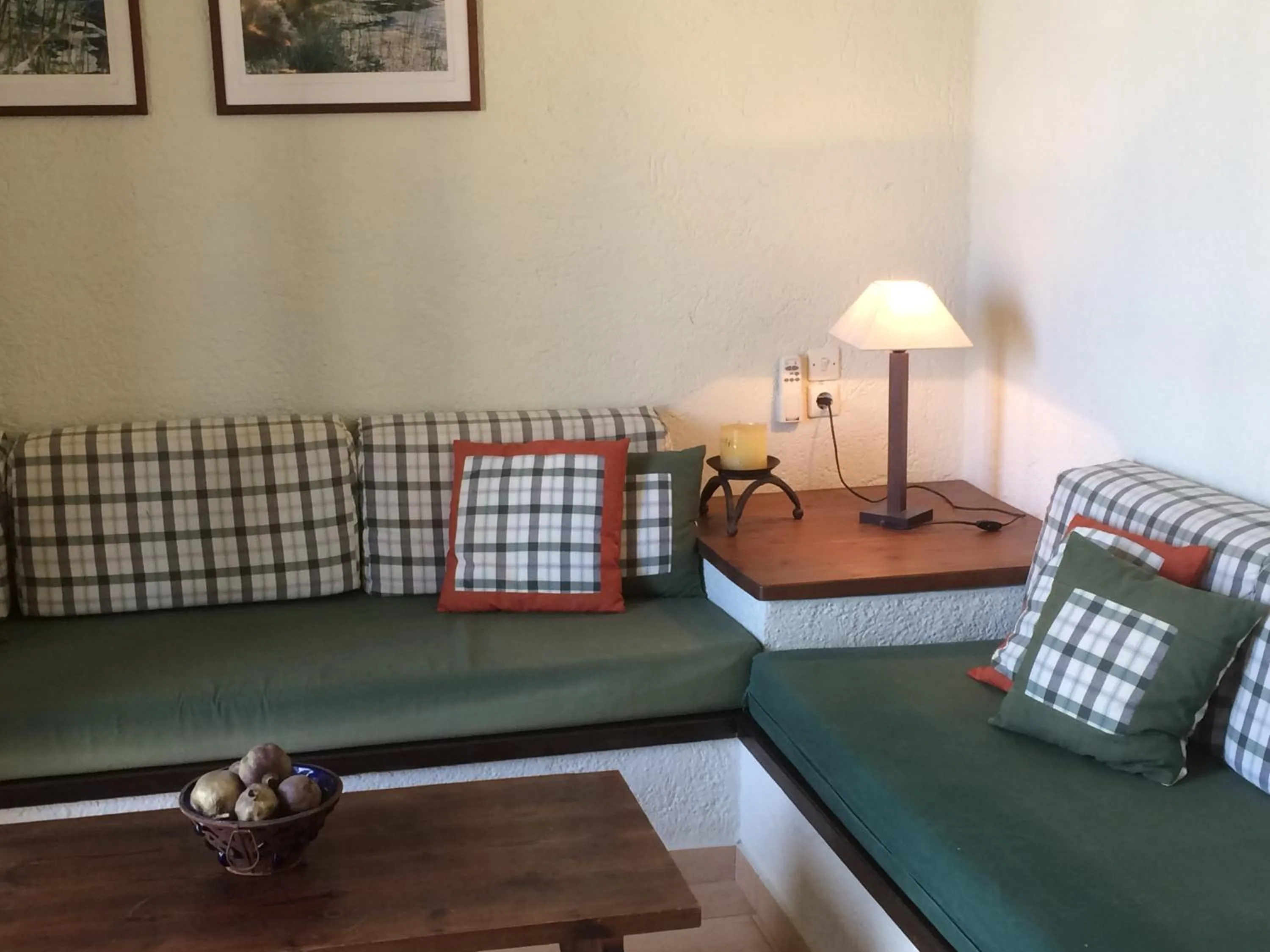 Living room, Bed in Porto Sisi Hotel Apartments