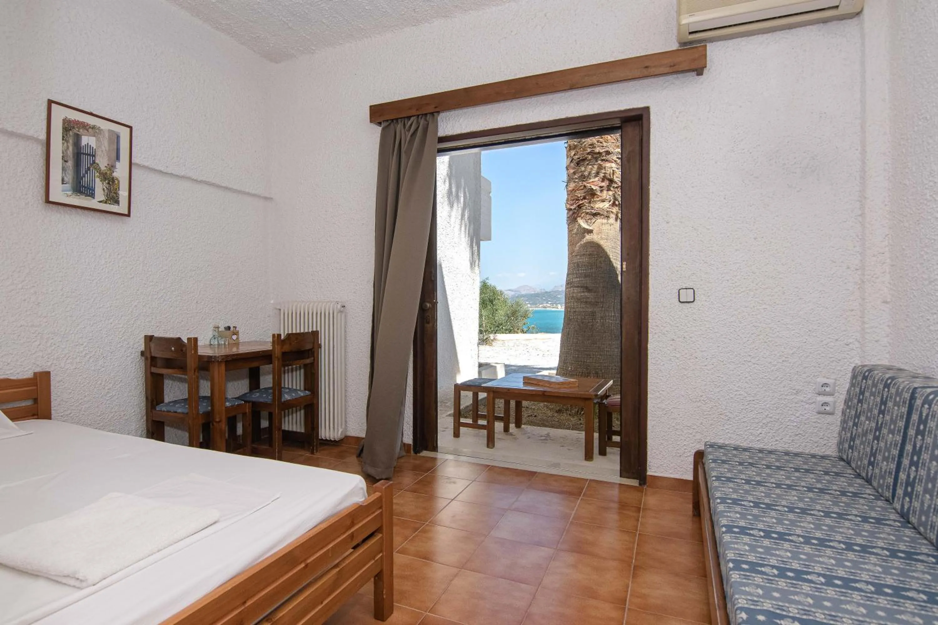 Seating area, Bed in Delfini Apartments