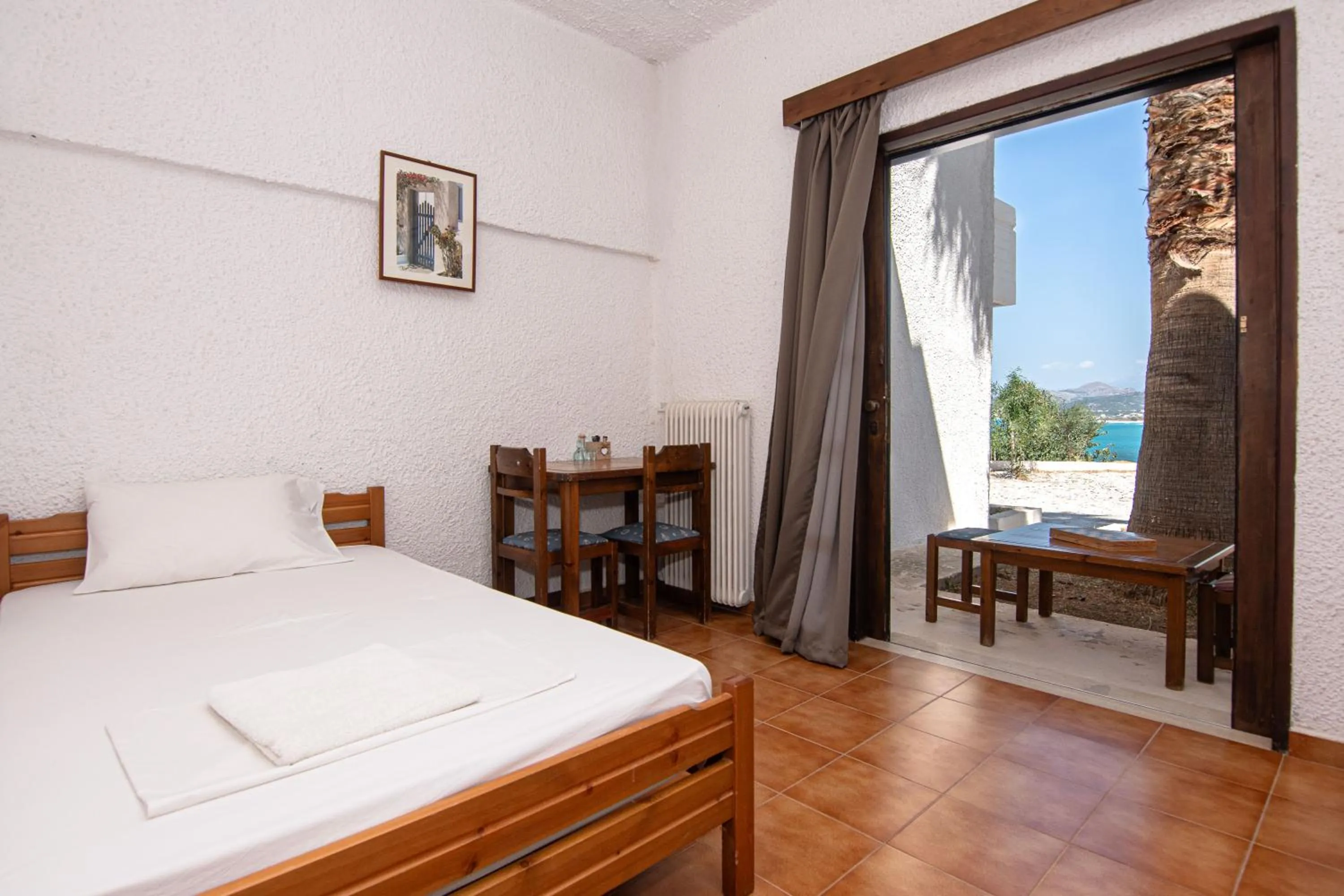 Seating area, Bed in Delfini Apartments