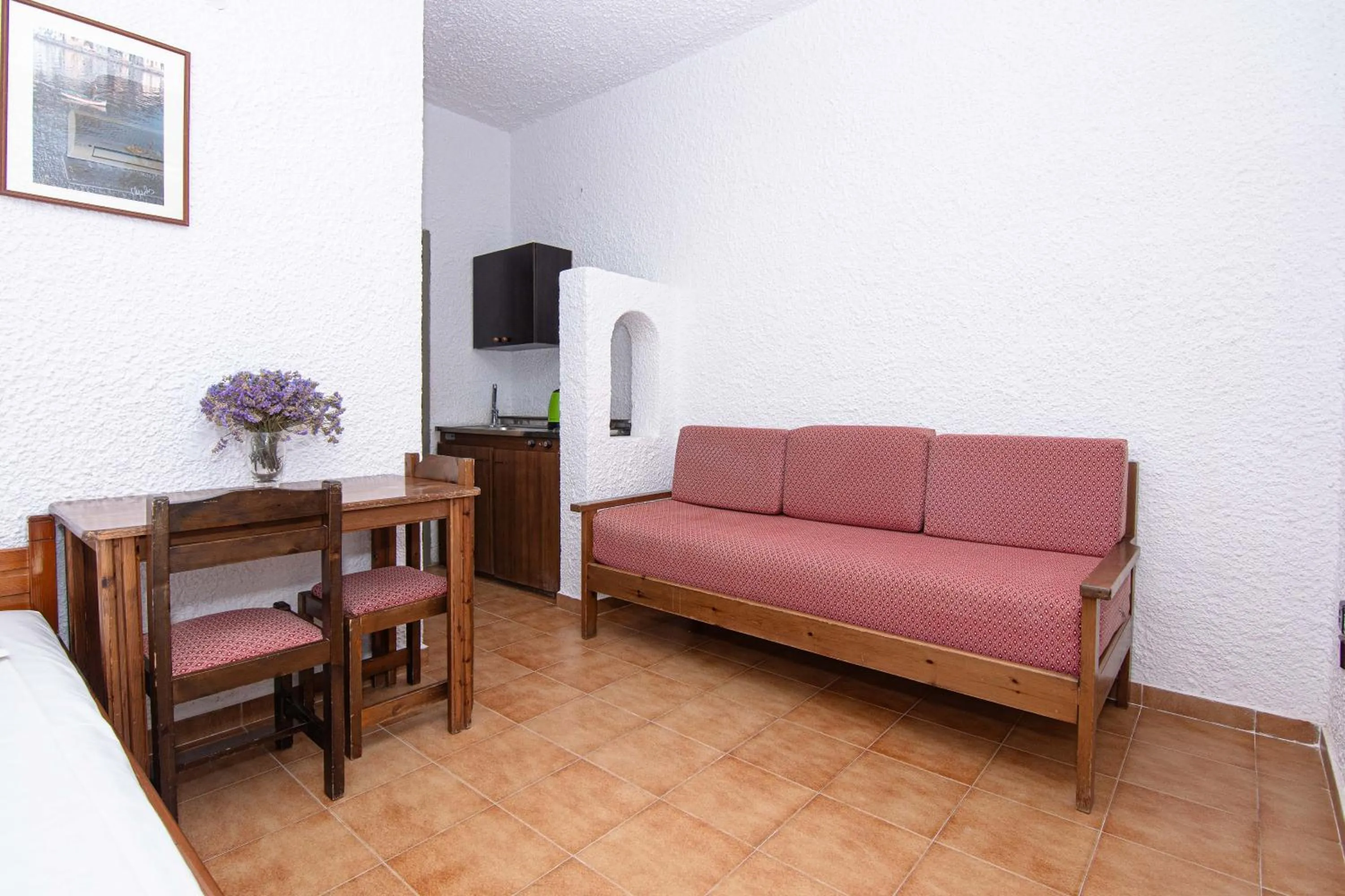 Seating area in Delfini Apartments