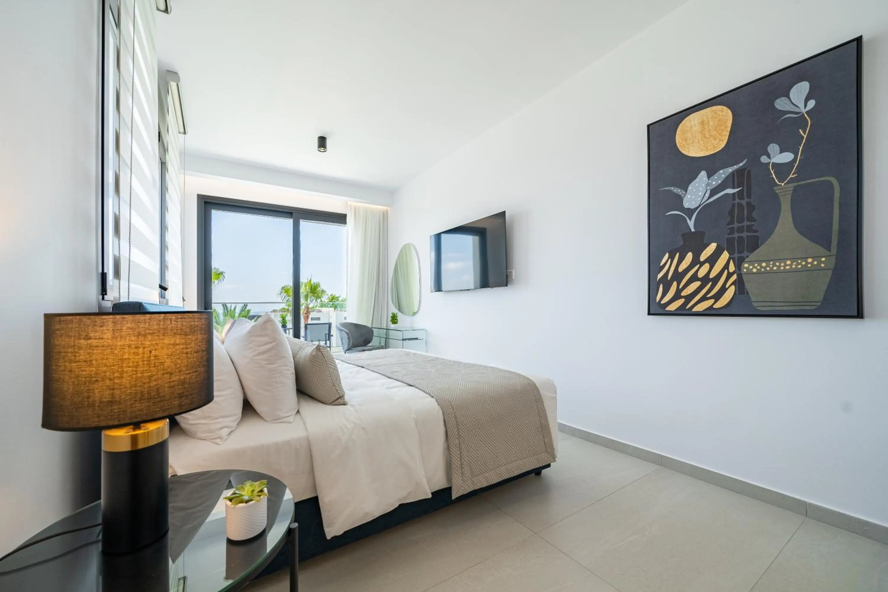 Bed in Waterside Sea View Apartments