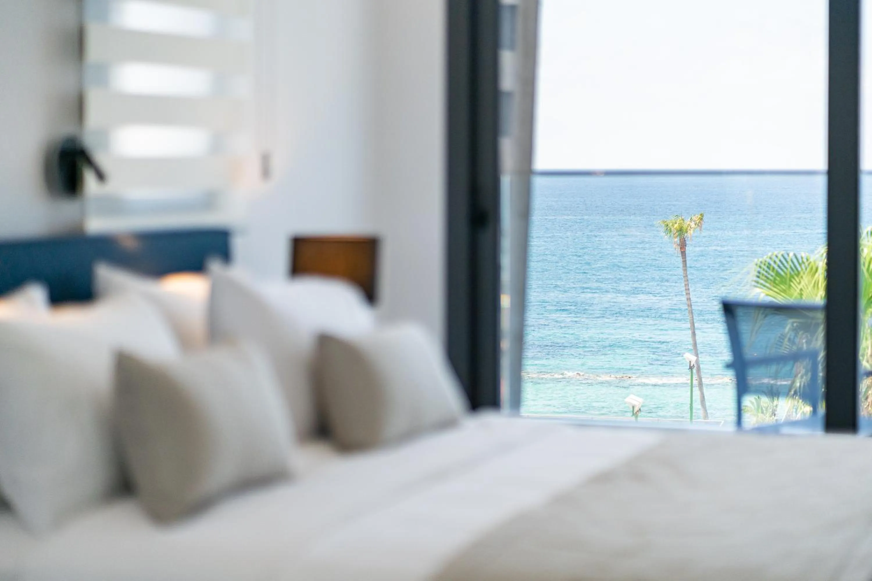 Bed in Waterside Sea View Apartments