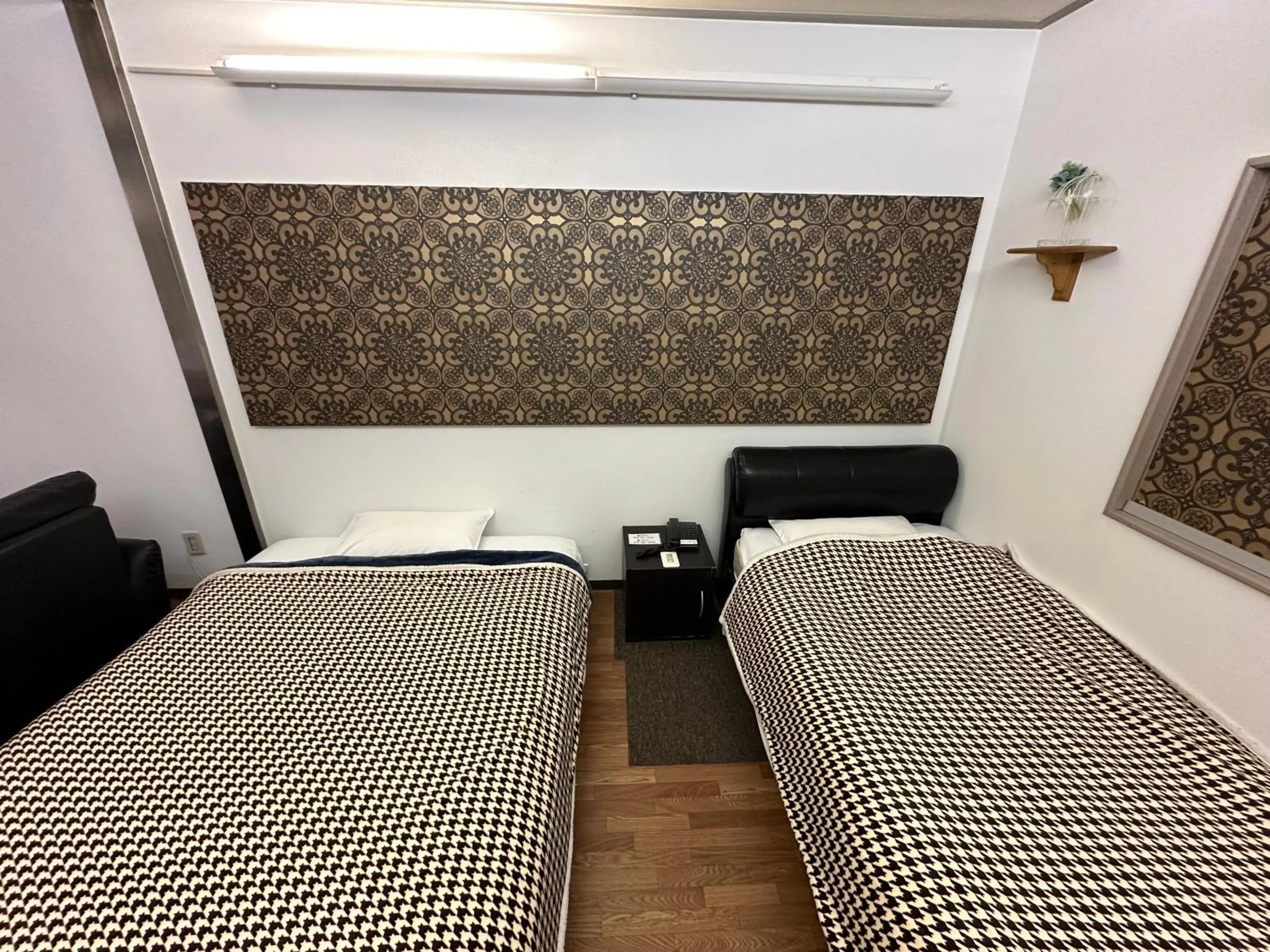 Bed in Hotel Rakusai