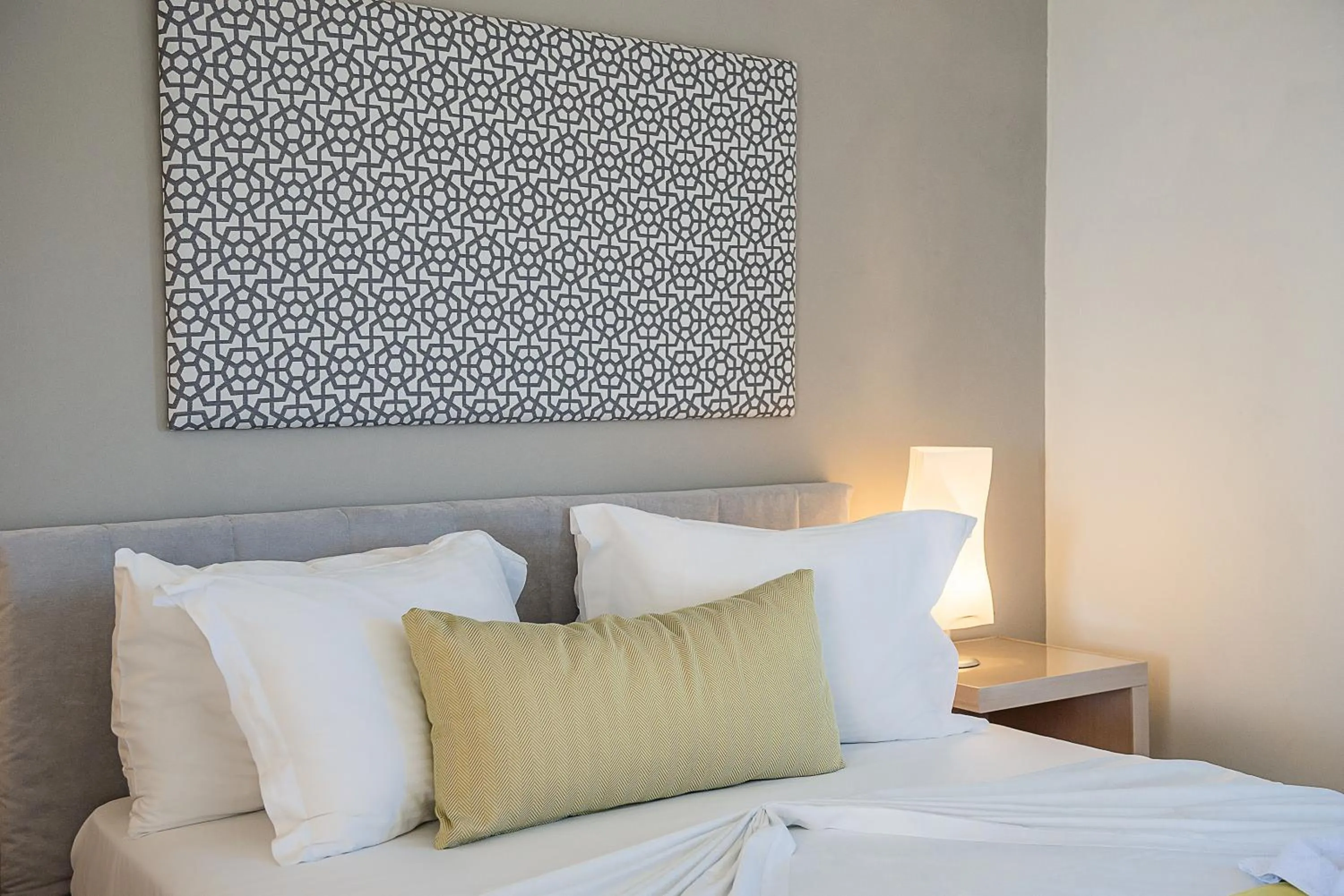 Bed in Kavos Hotel & Suites