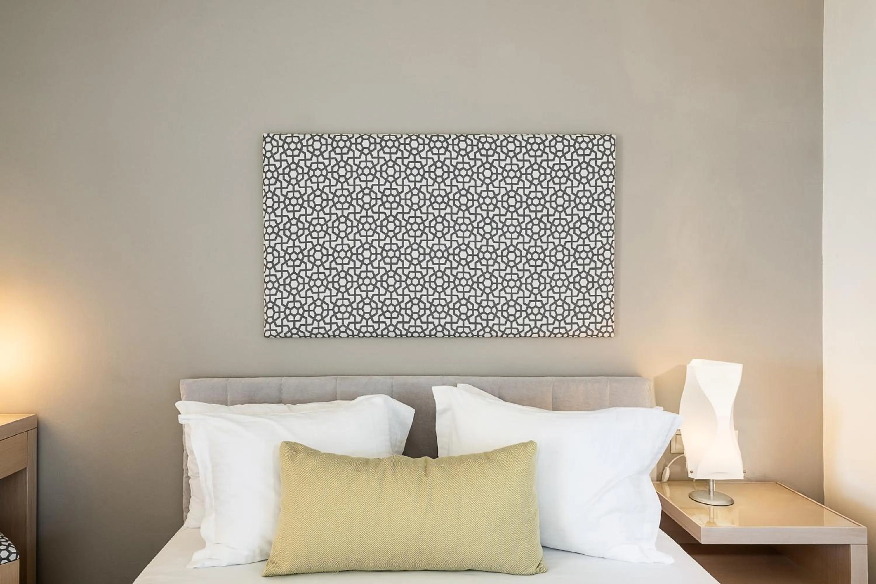 Bed in Kavos Hotel & Suites