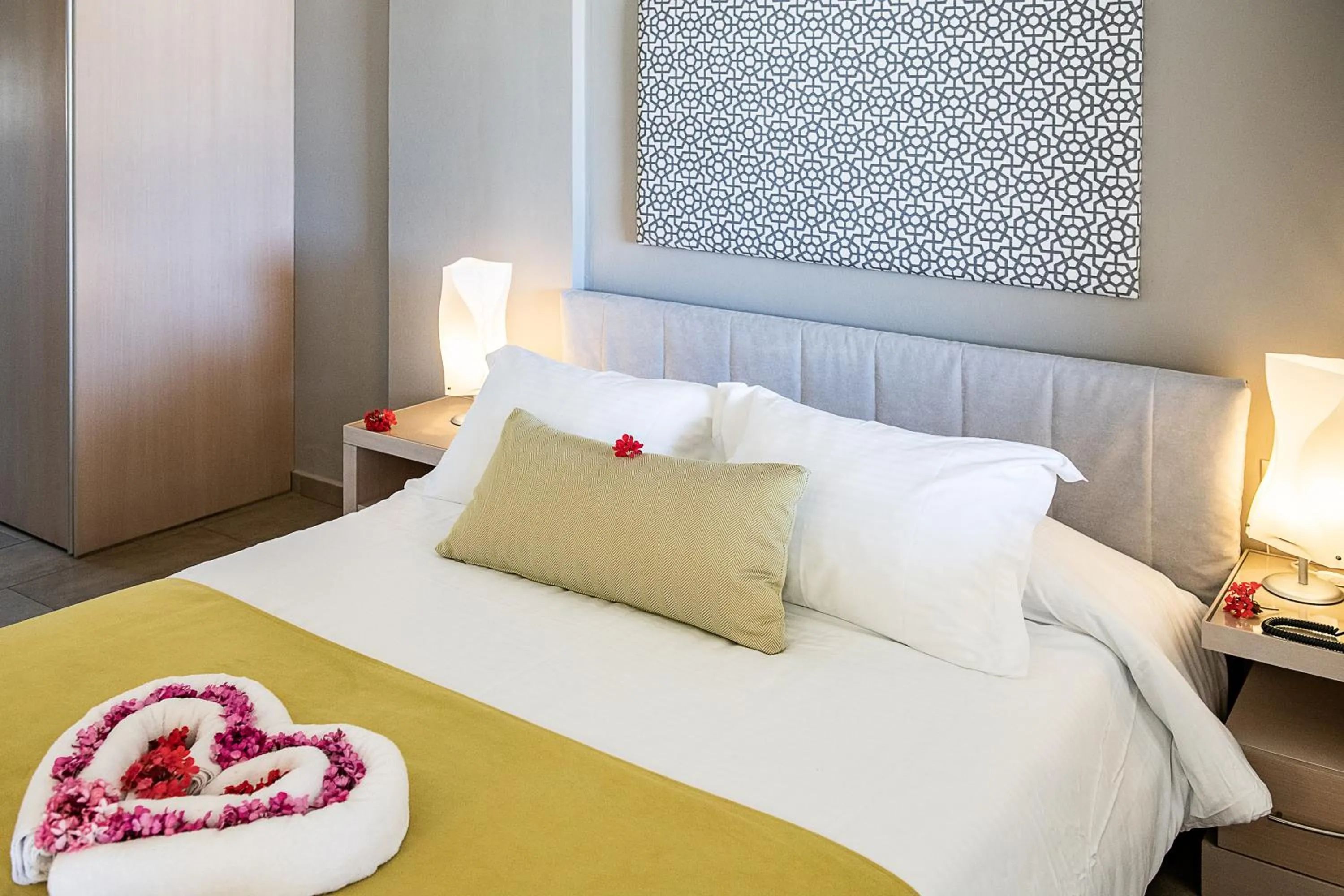 Bed in Kavos Hotel & Suites