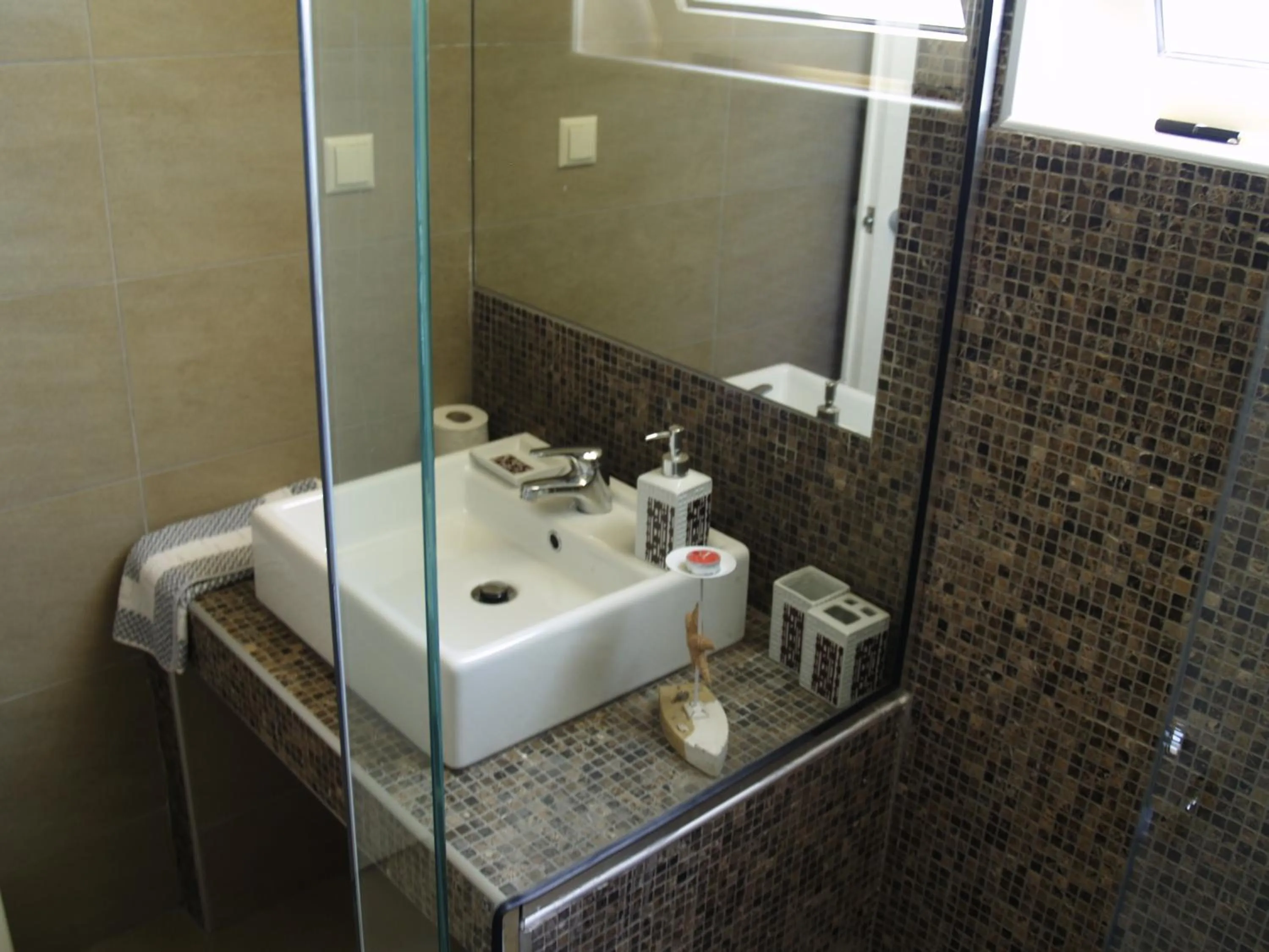 Bathroom in Kavos Hotel & Suites