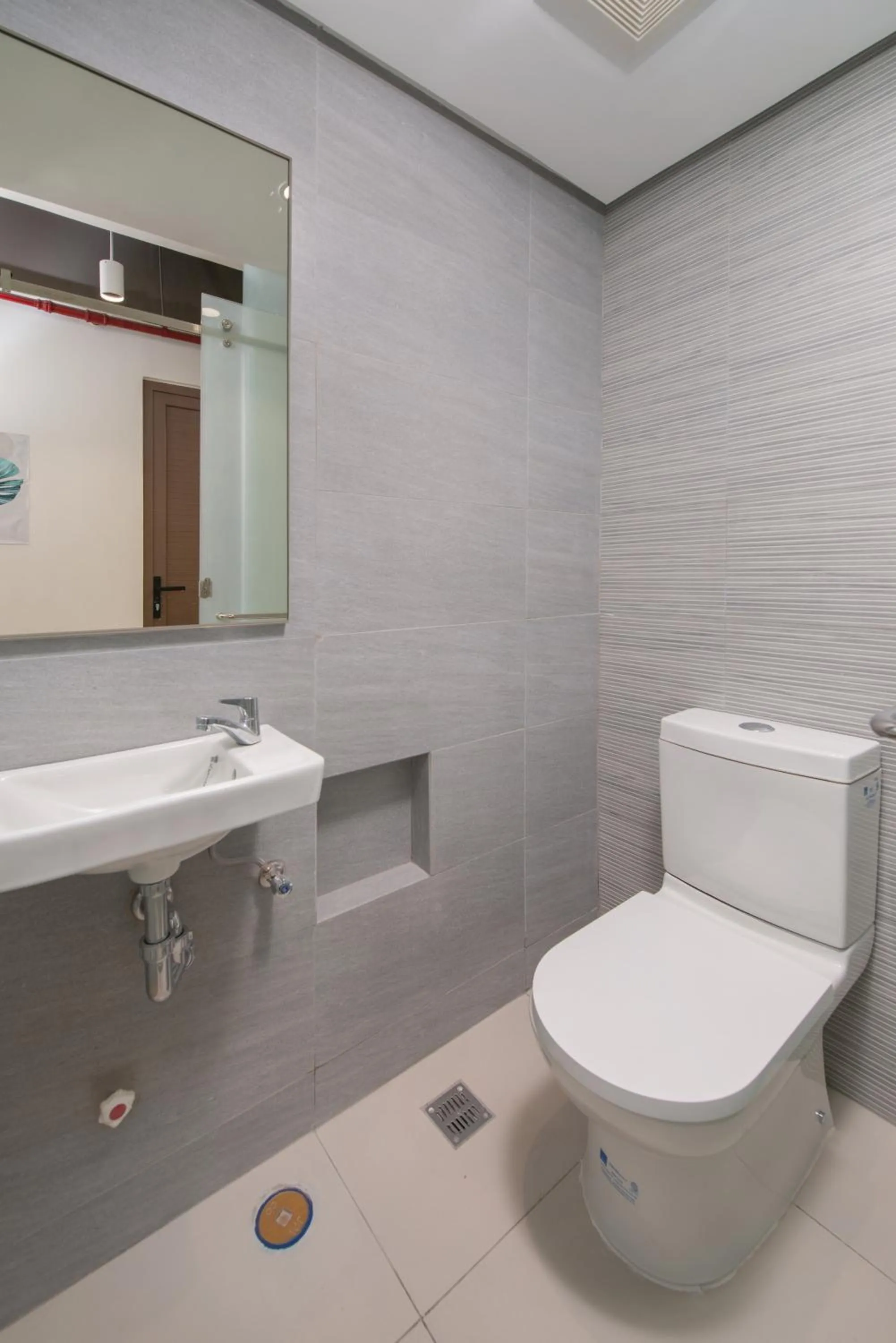 Toilet in The Grid Co-Living Managed by HII