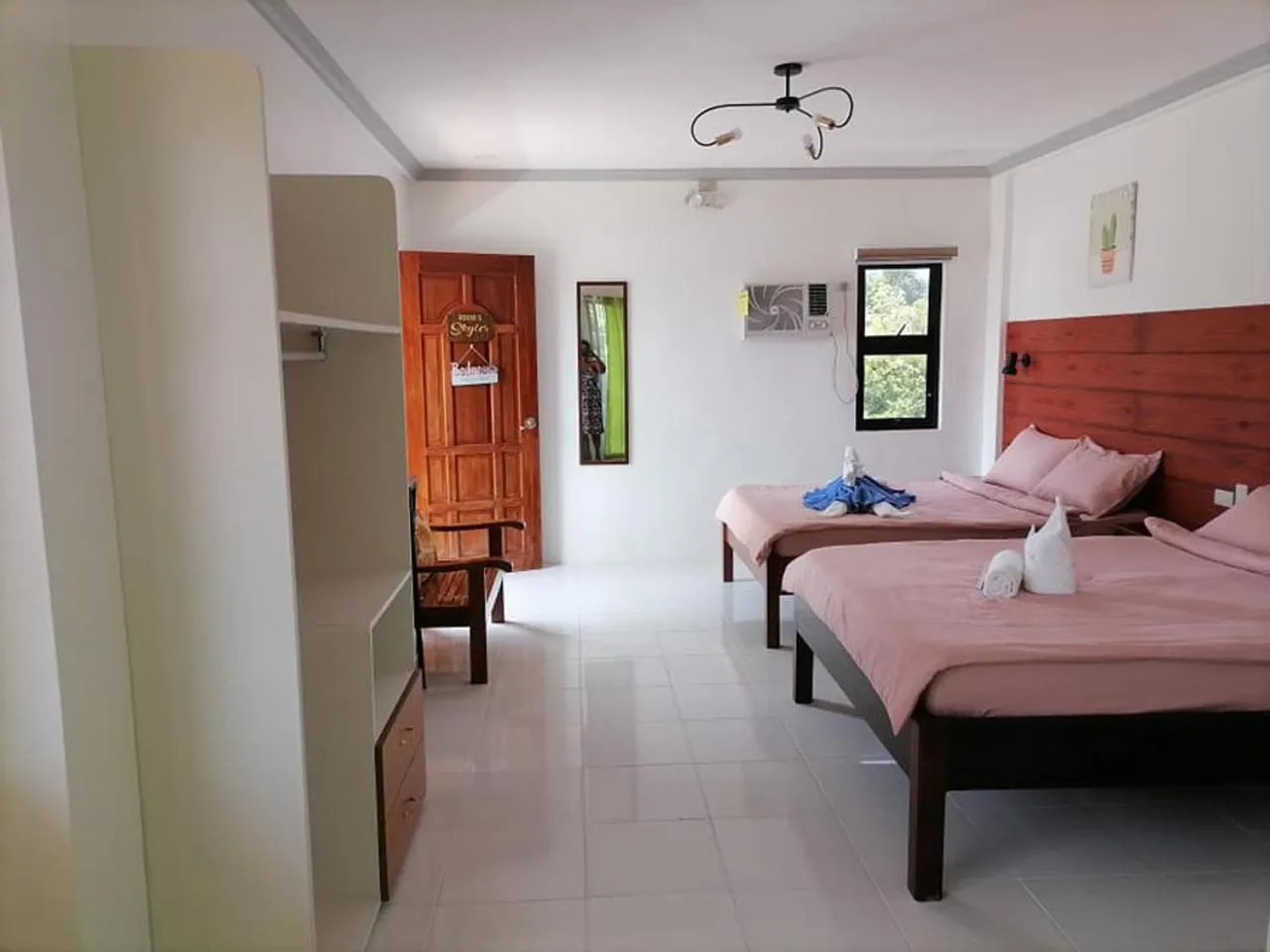 Bedroom, Bed in La Bella Swiss Inn