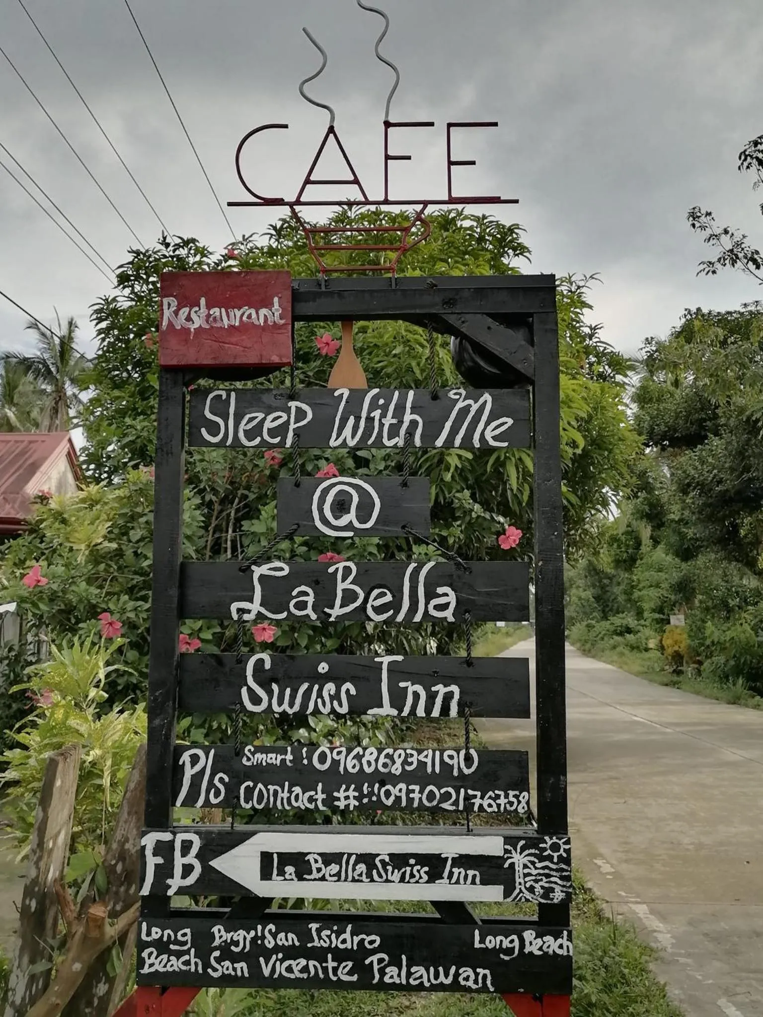 Property logo or sign in La Bella Swiss Inn