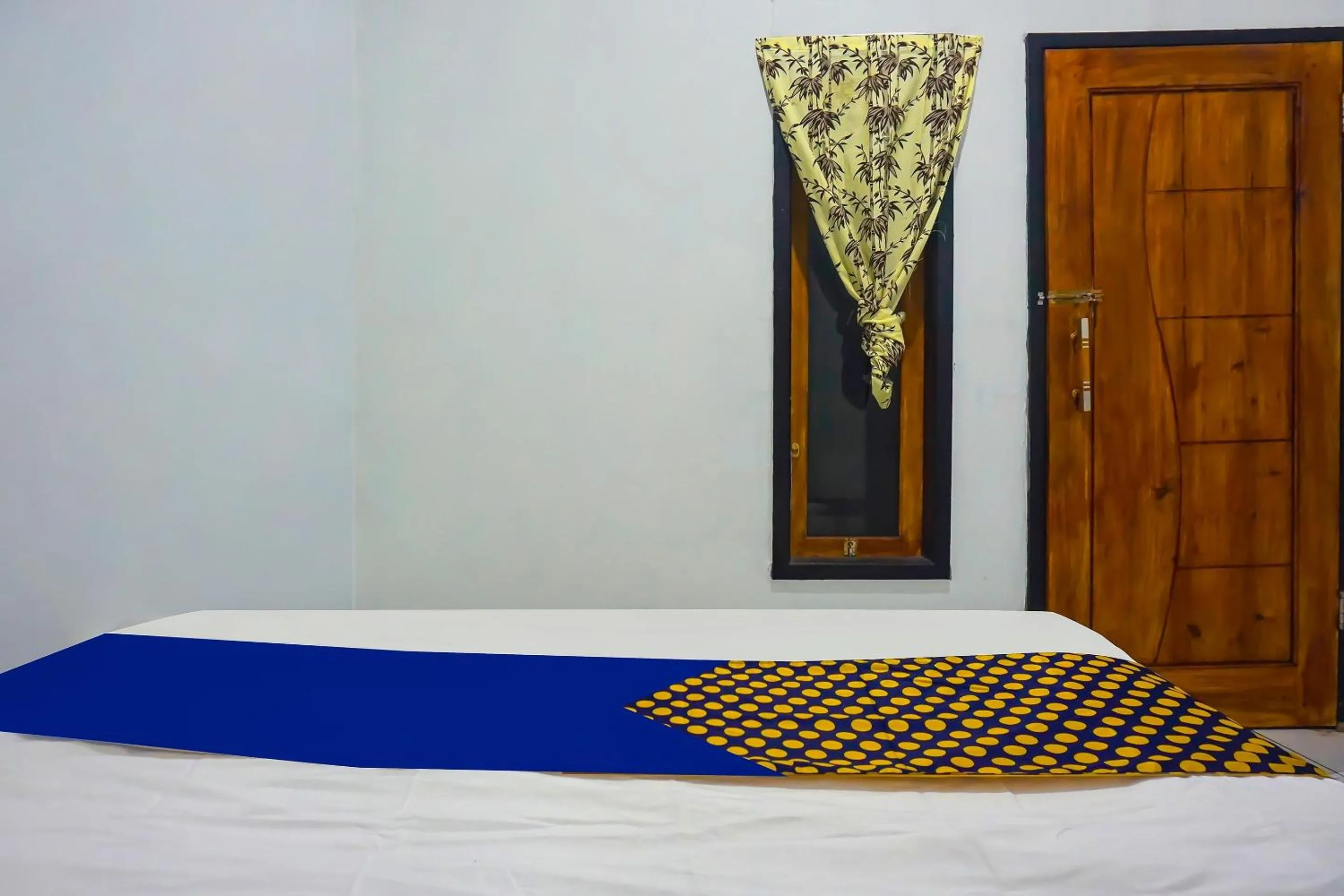 Bedroom in Hotel O Nusasari Guest House