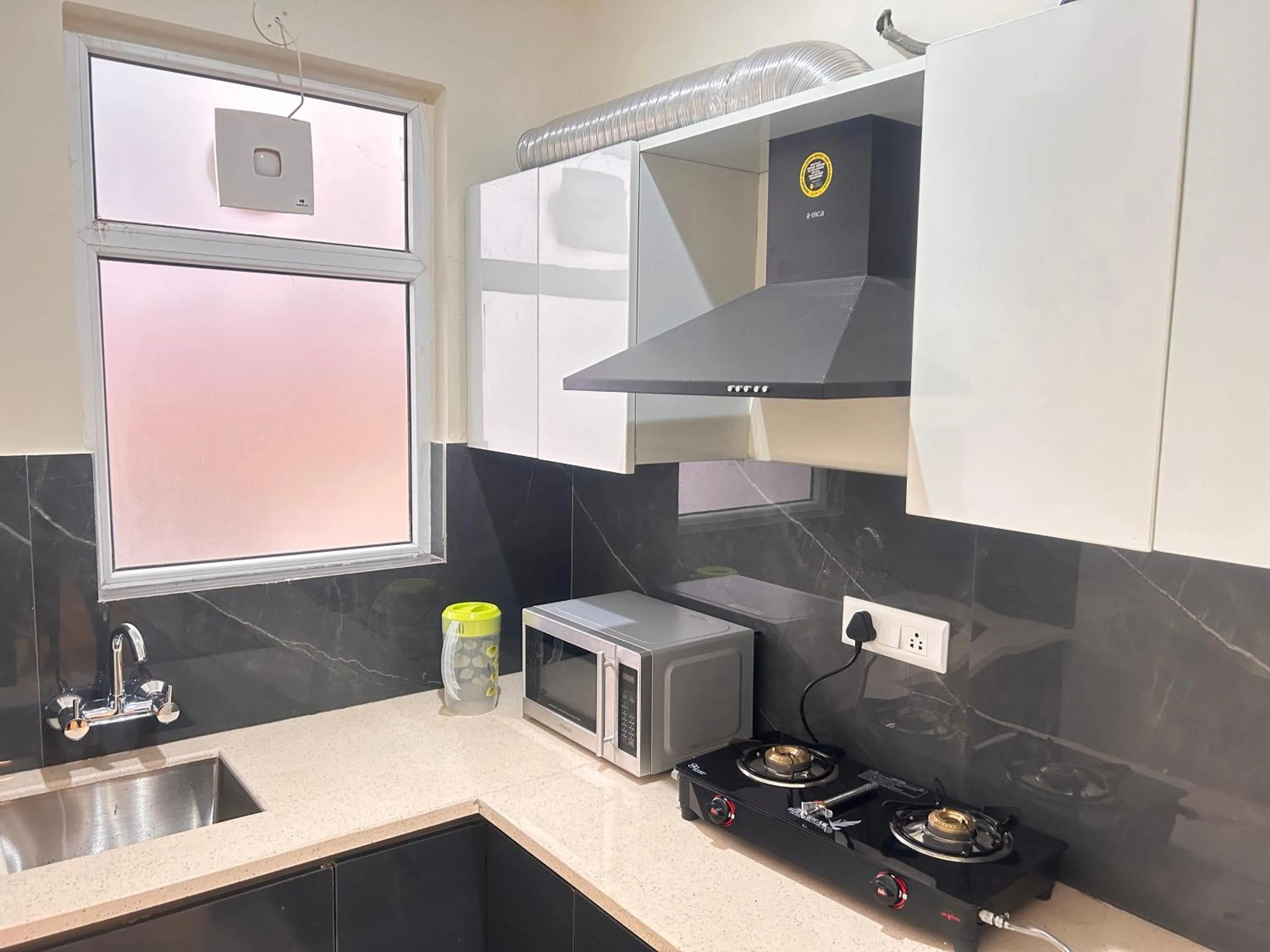 kitchen in Lime Tree 1BHK Serviced Apartment - Medanta Medicity, Gurgaon