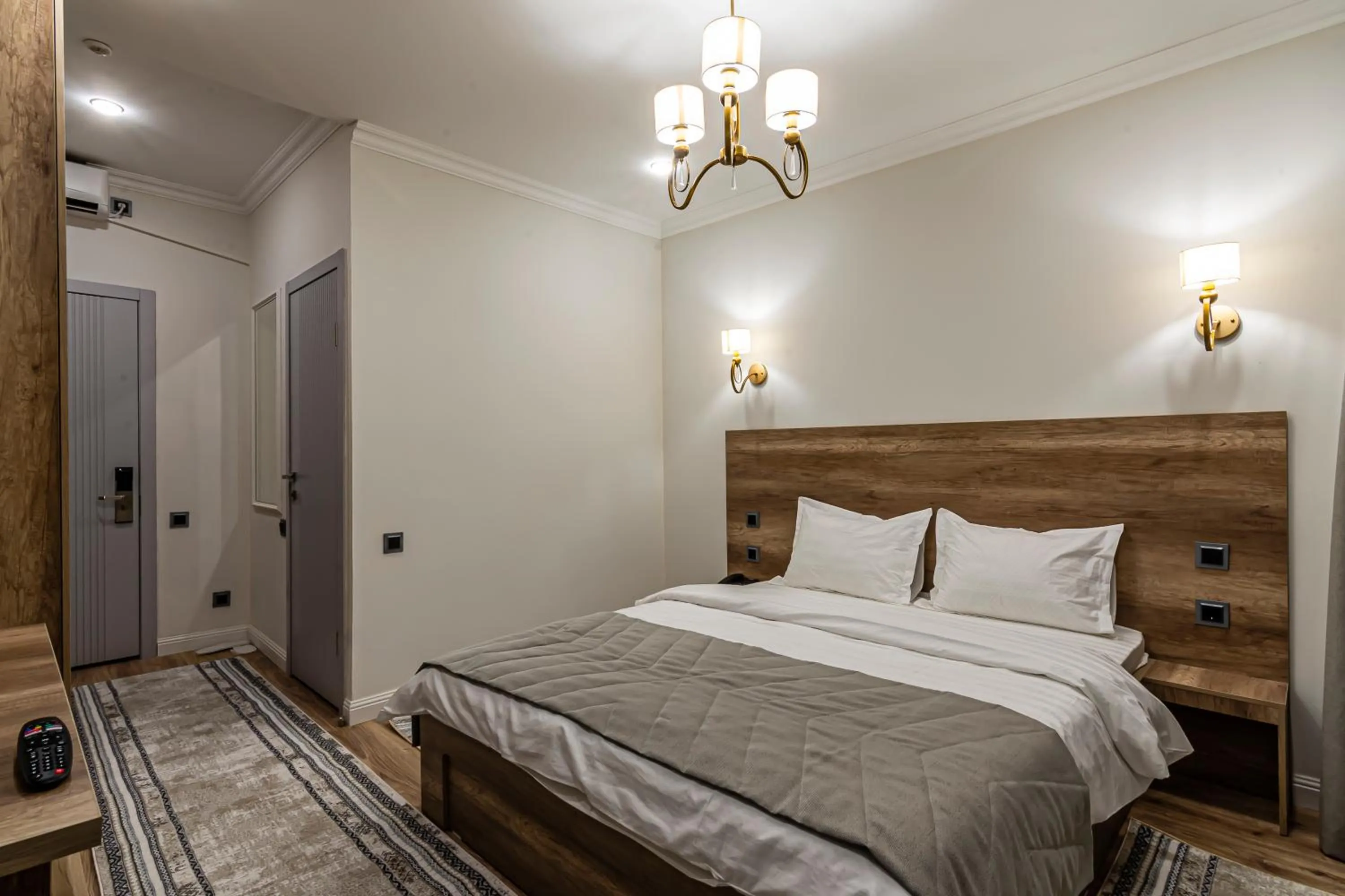 Bed in Oscar Hotel by AG Hotels Group