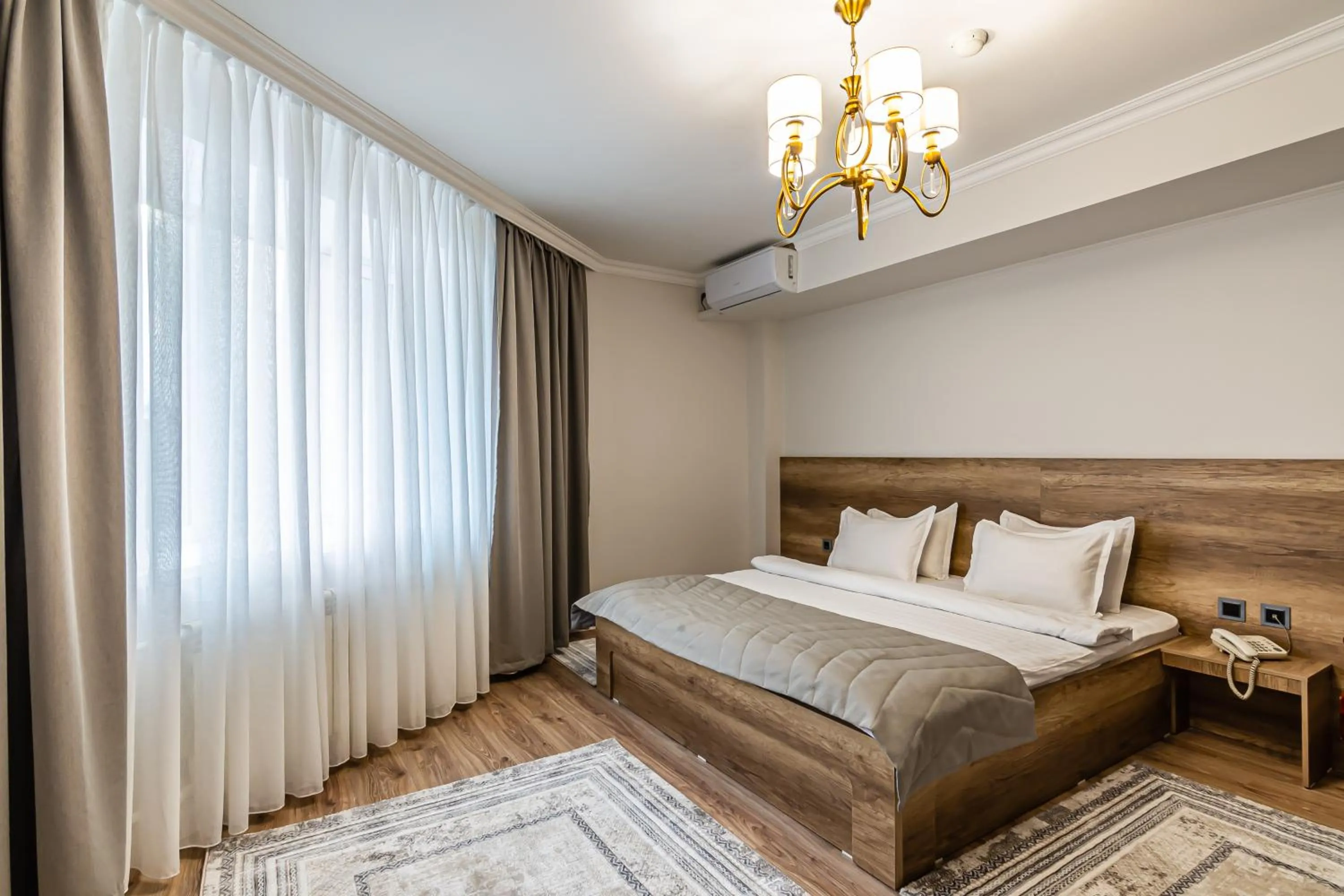 Photo of the whole room, Bed in Oscar Hotel by AG Hotels Group