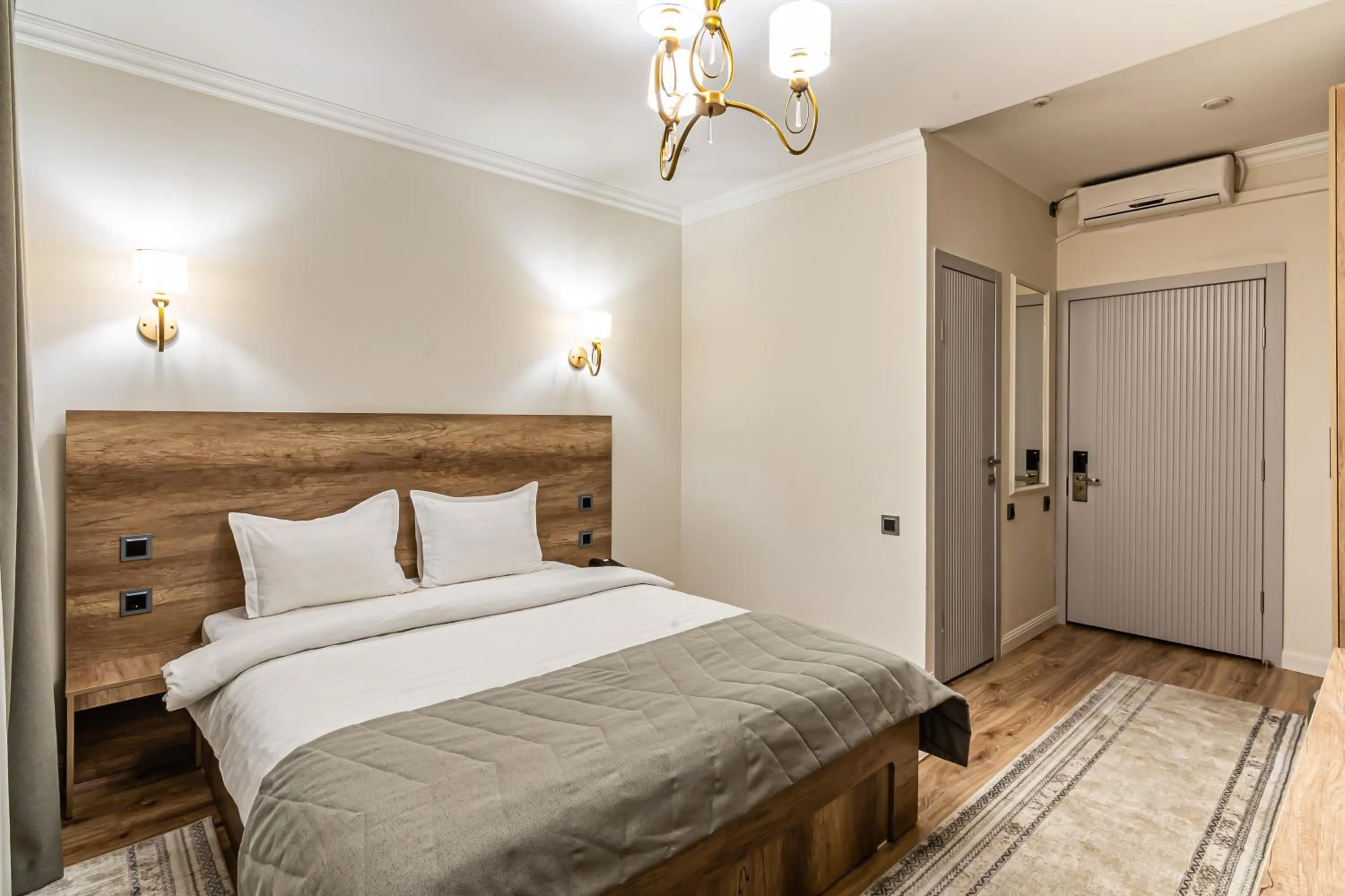 Bed in Oscar Hotel by AG Hotels Group