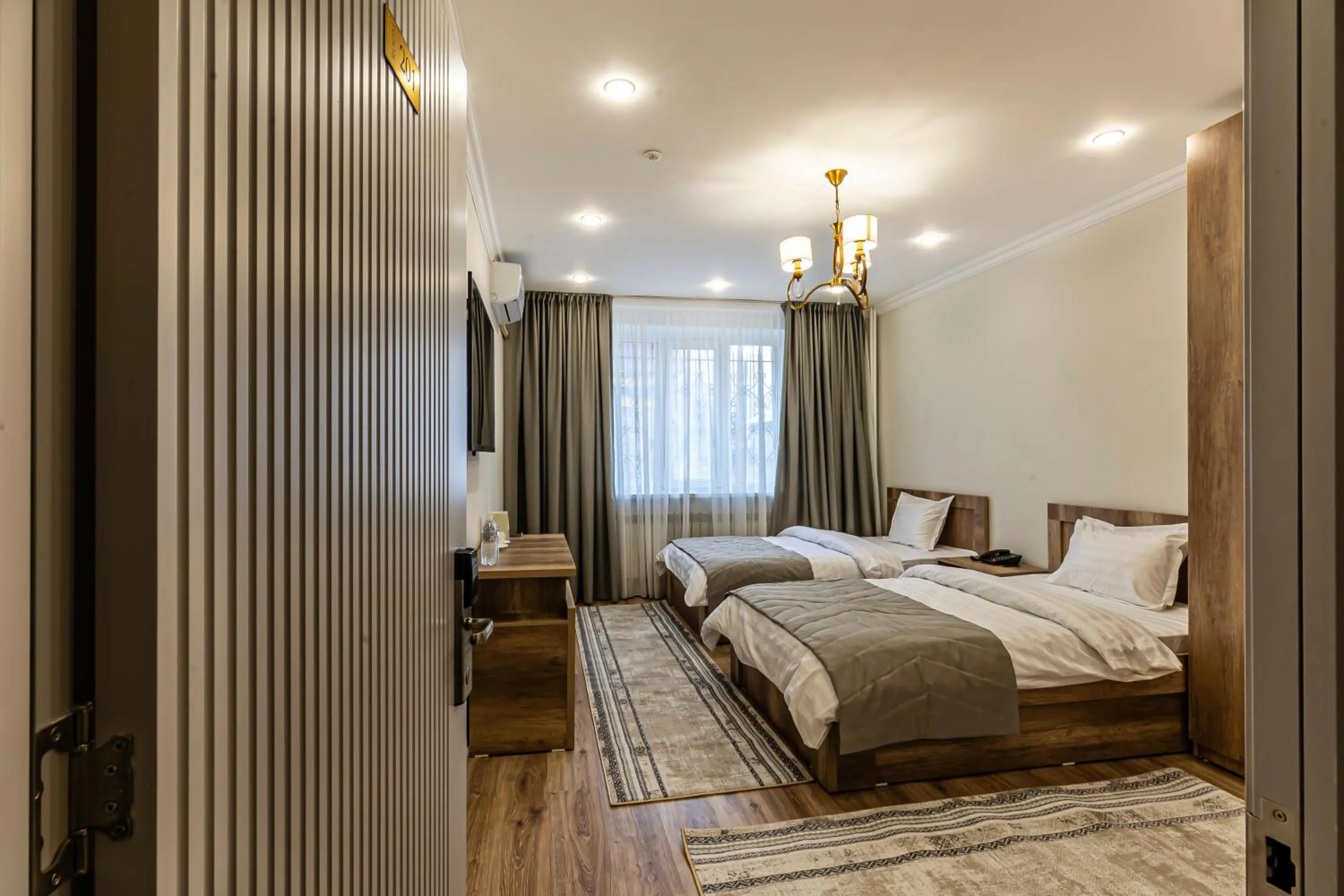 Photo of the whole room, Bed in Oscar Hotel by AG Hotels Group