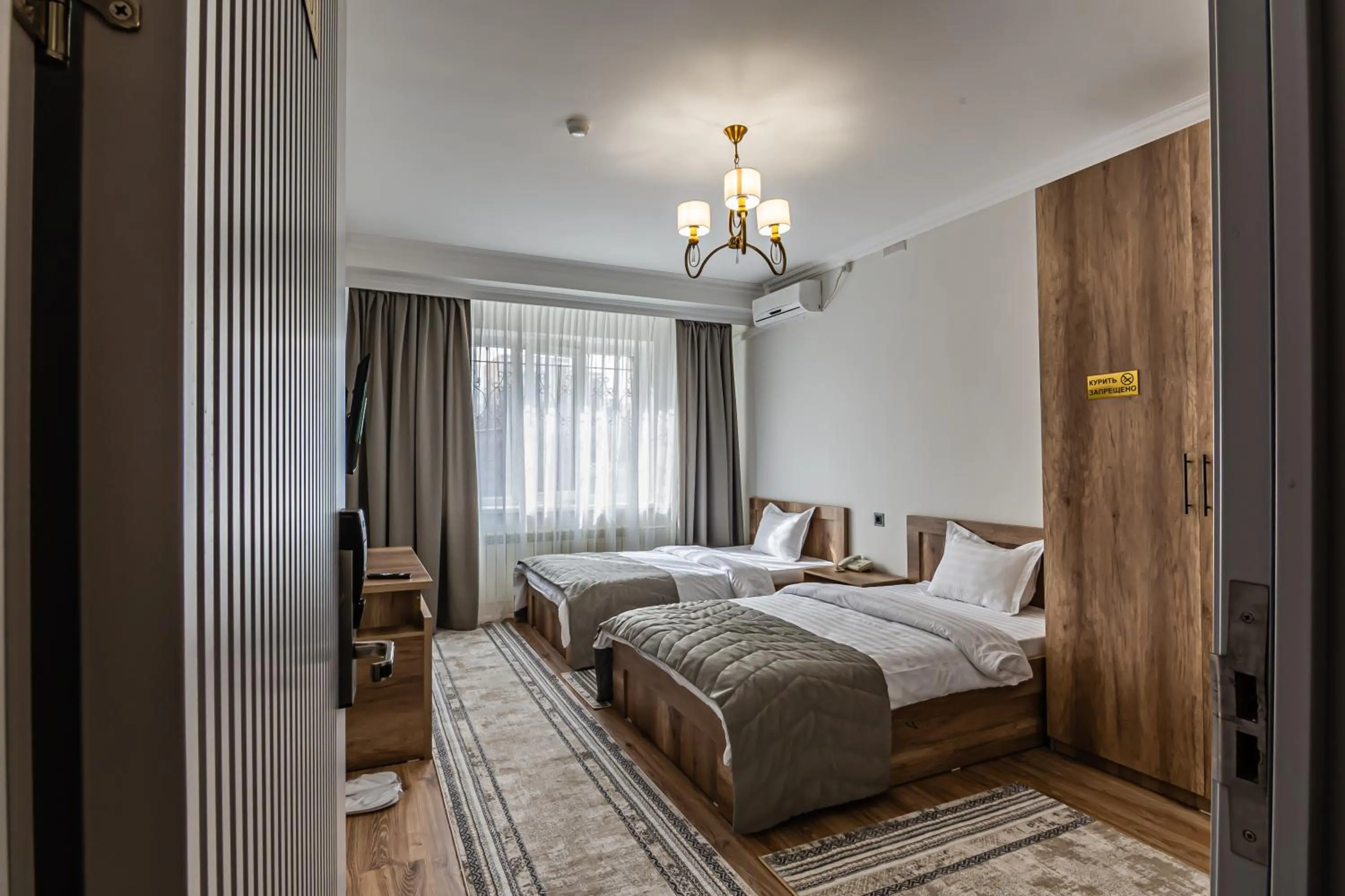 Bed in Oscar Hotel by AG Hotels Group