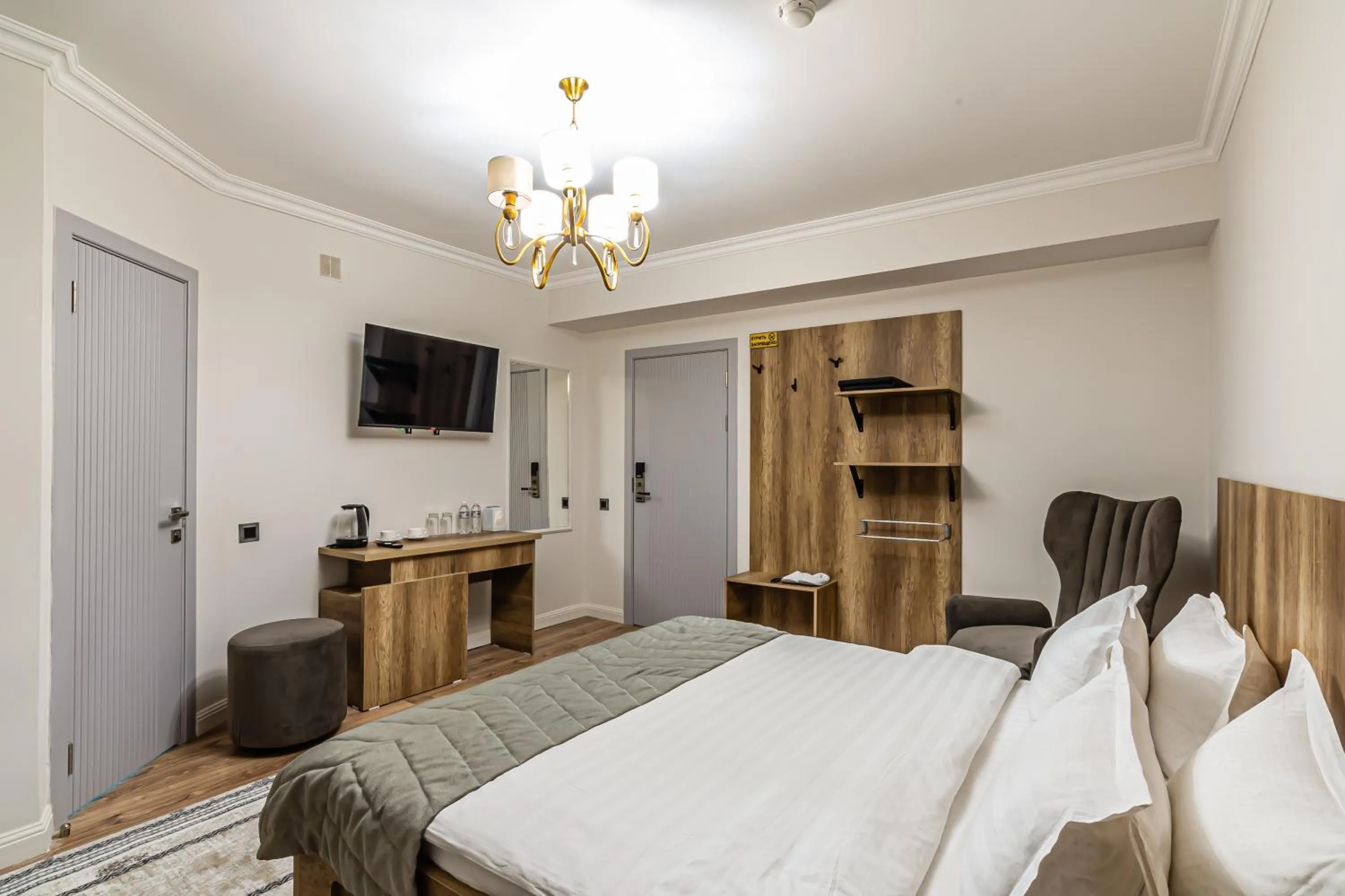 Communal lounge/ TV room, Bed in Oscar Hotel by AG Hotels Group